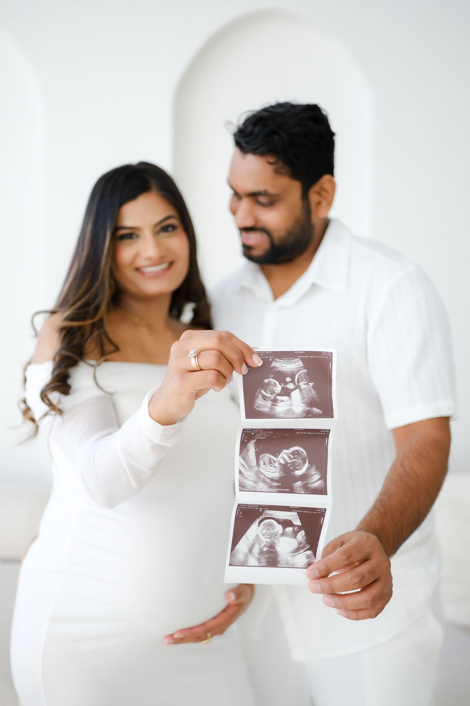 Couple with ultrasound photos during maternity shoot. Maternity photographer Toronto, family portraits, Nadia, GTA, majestystudios, couple