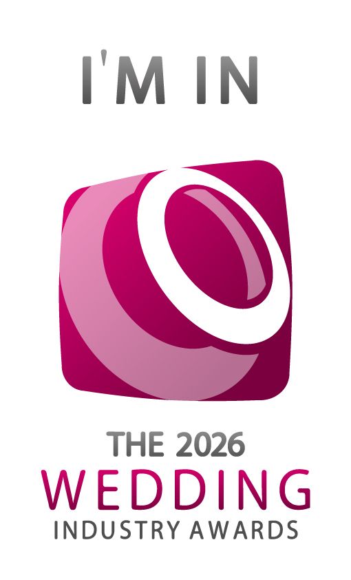 A pink and magenta logo design for 'The 2026 Wedding Industry Awards' featuring abstract circular shapes in a square frame.