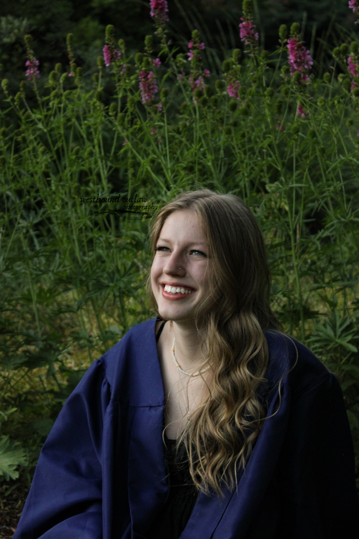 senior smiling and looking off into distance