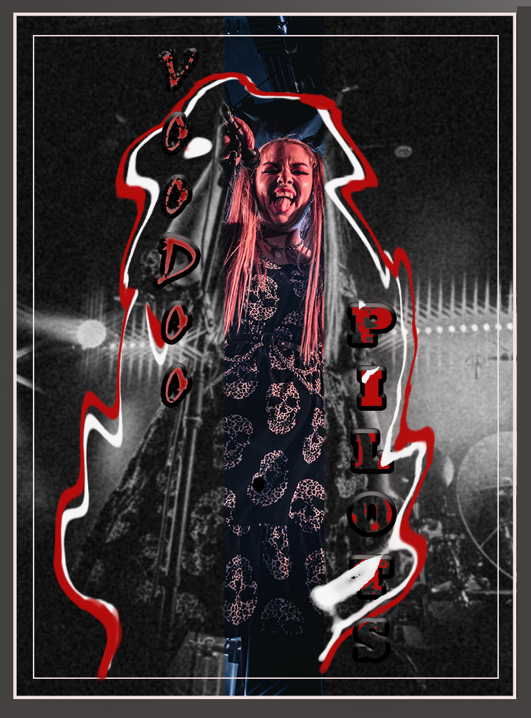 A female performer sings on stage with red neon outlines and Voodoo Pins text overlay in a dark concert setting.