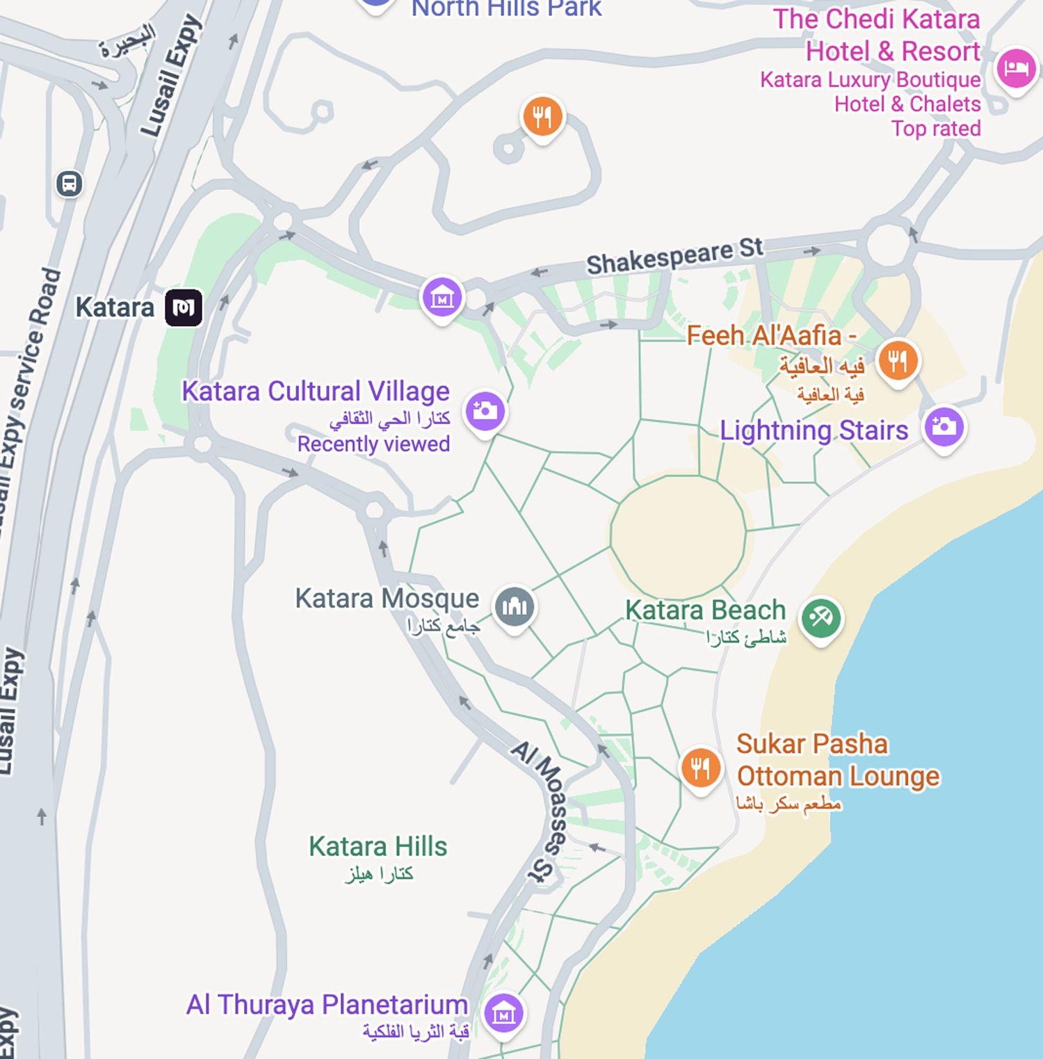 Aerial map view showing the Katara Cultural Village area with nearby landmarks and streets in Qatar.