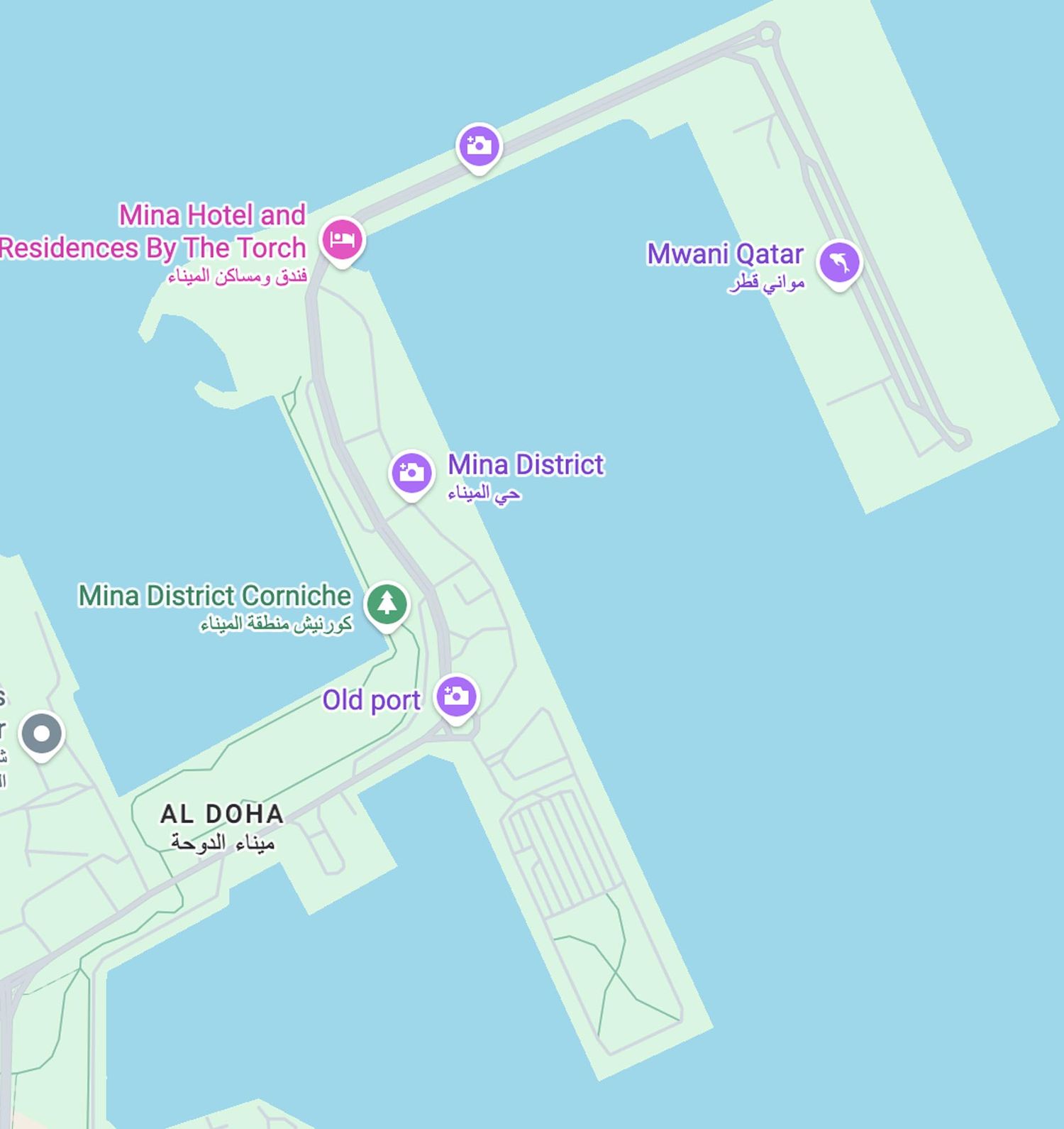 Map view of Mina District and Al Doha area in Qatar showing waterfront locations and port facilities.