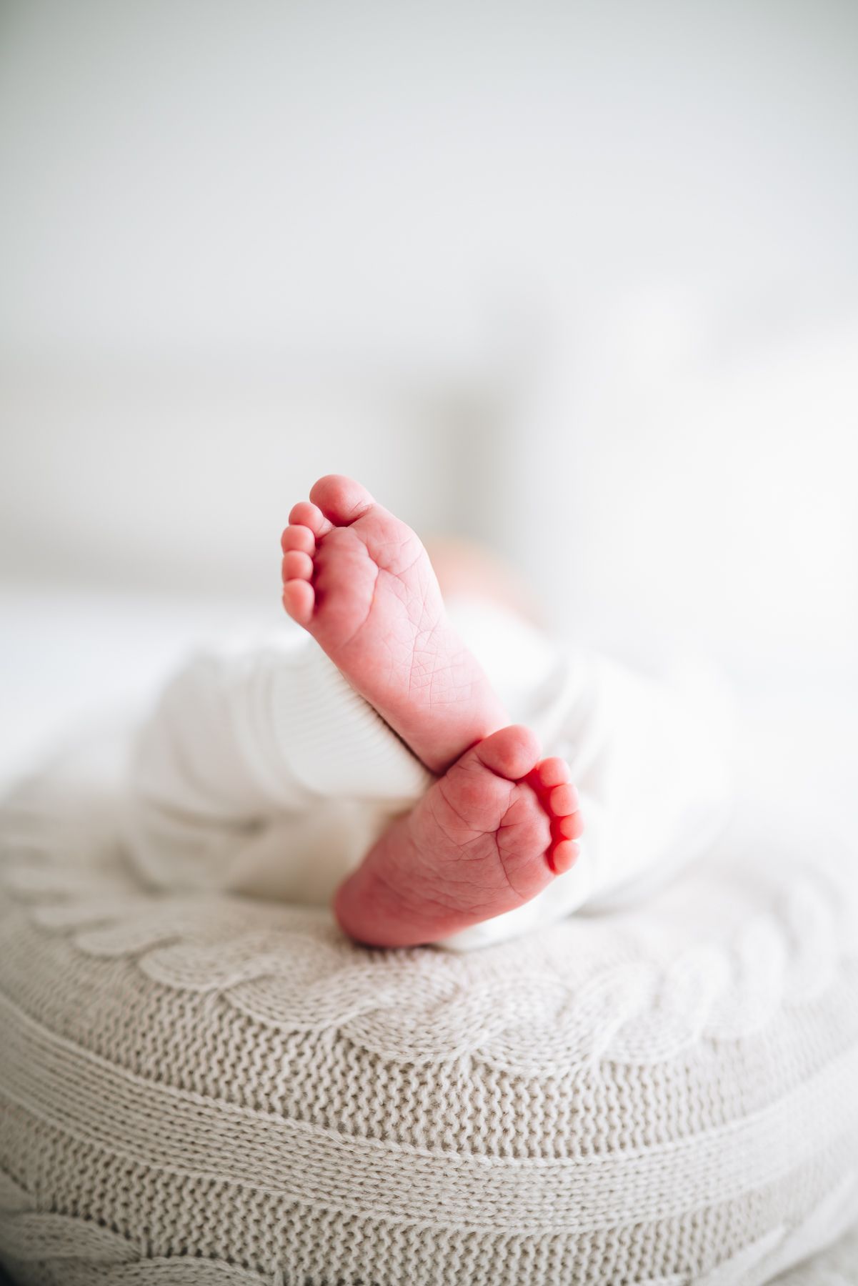 Photo of a pair of newborn feet taken during a Melbourne Newborn Photo session.
