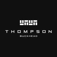 Black and white Thompson Buckhead luxury brand logo with geometric design on dark background.