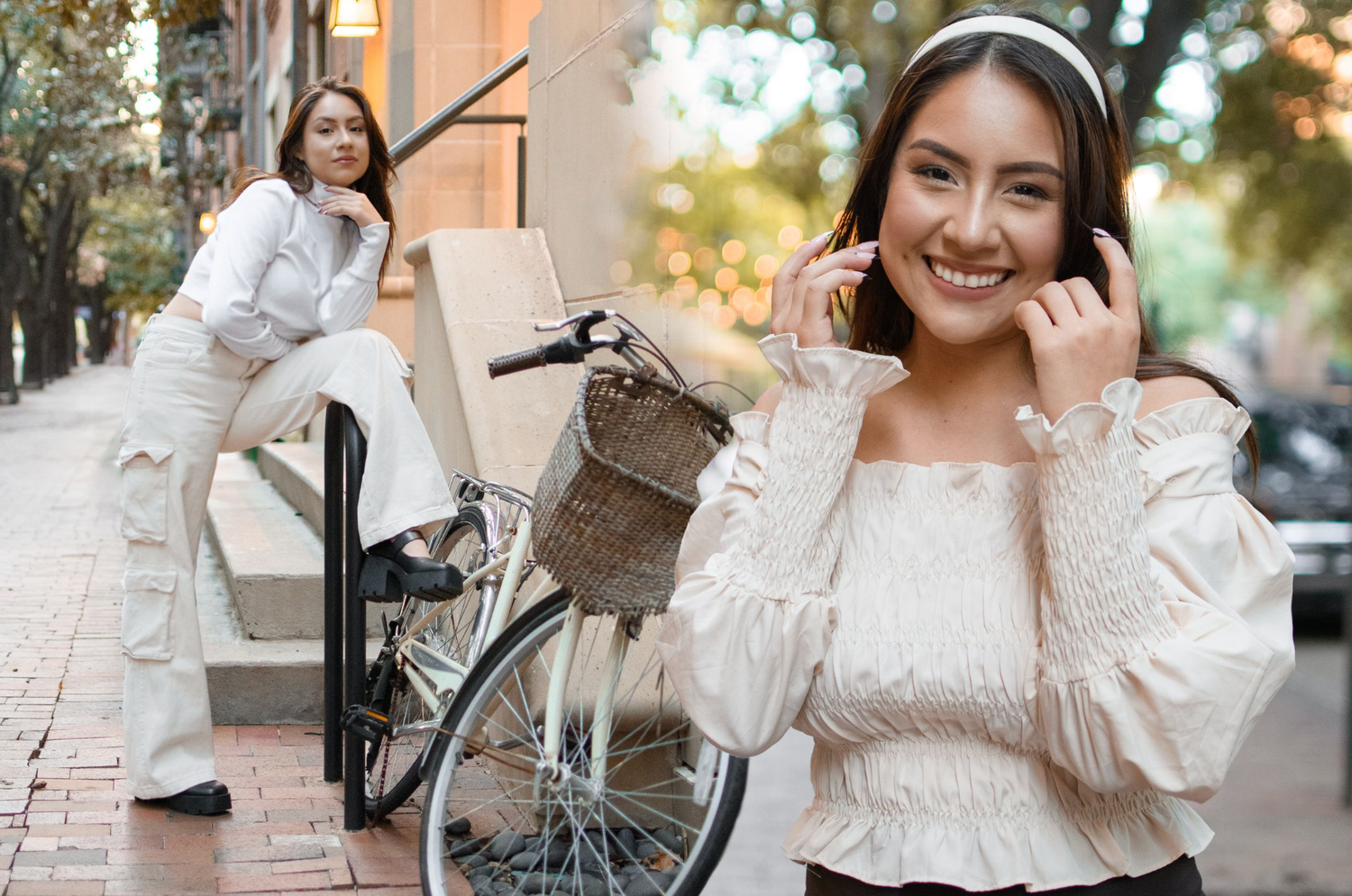 Two young women pose outdoors near a bicycle, one wearing headphones and a white ruffled blouse on a city street.