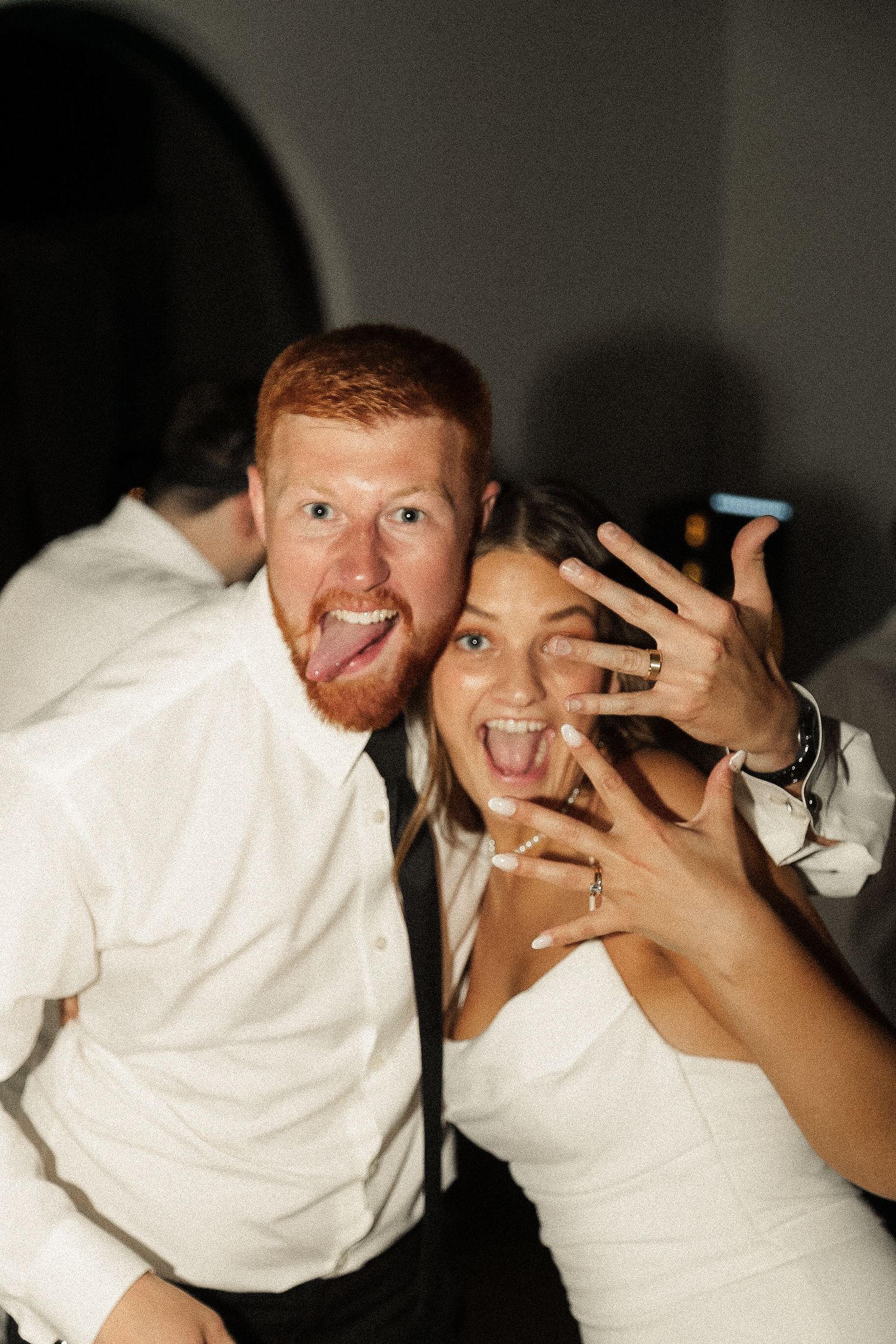 Playful newlyweds pose together showing off their wedding rings in a sequence of candid shots.