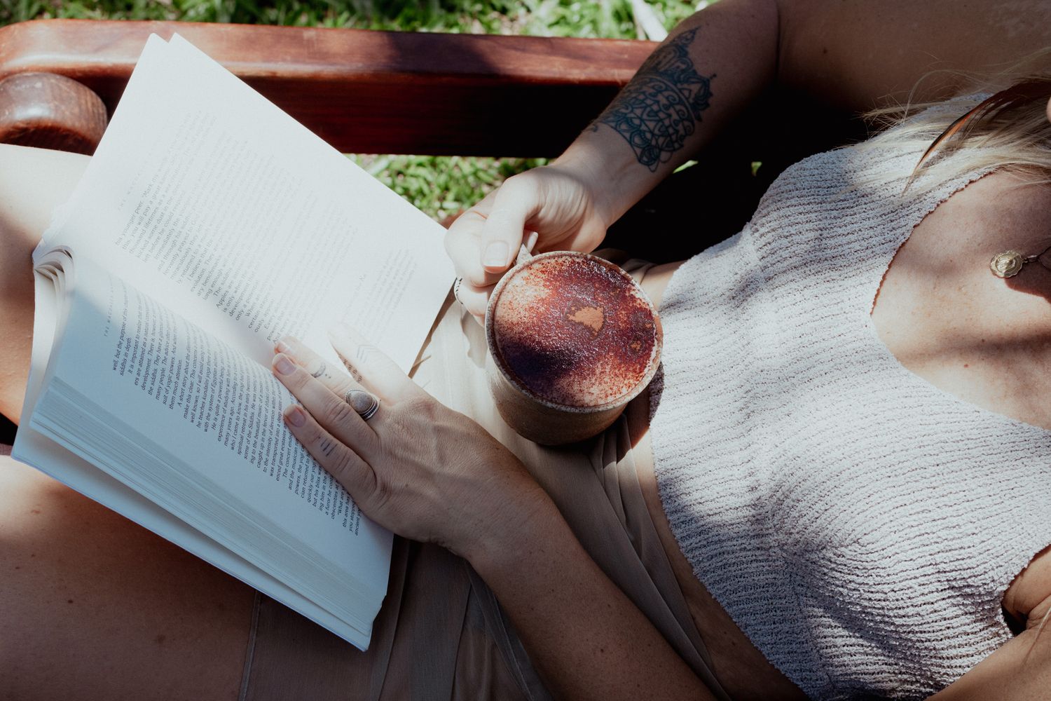 Relaxing scene with books and casual reading on comfortable cushions.
