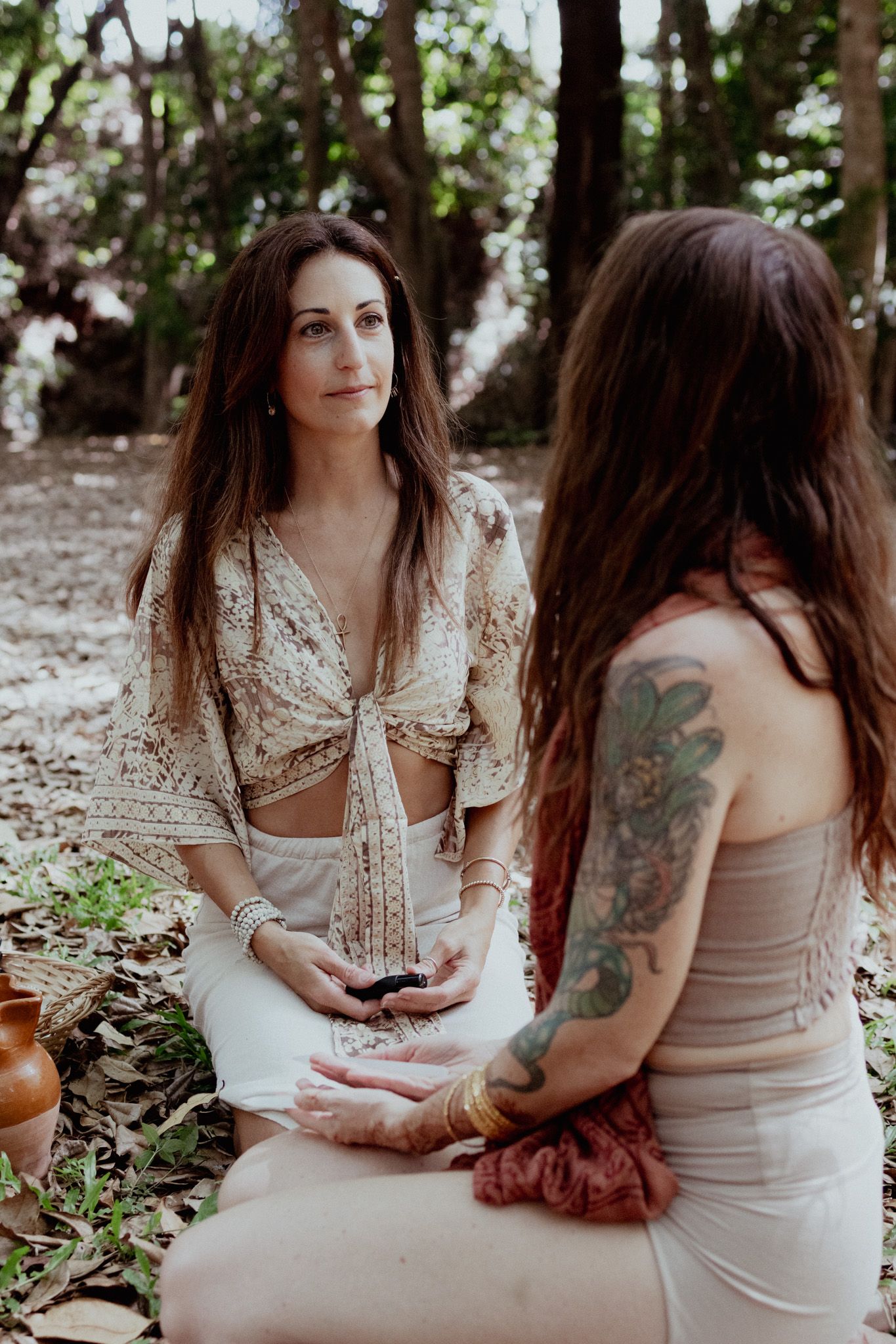 A romantic outdoor portrait session featuring vintage-inspired lace and cream colored clothing.