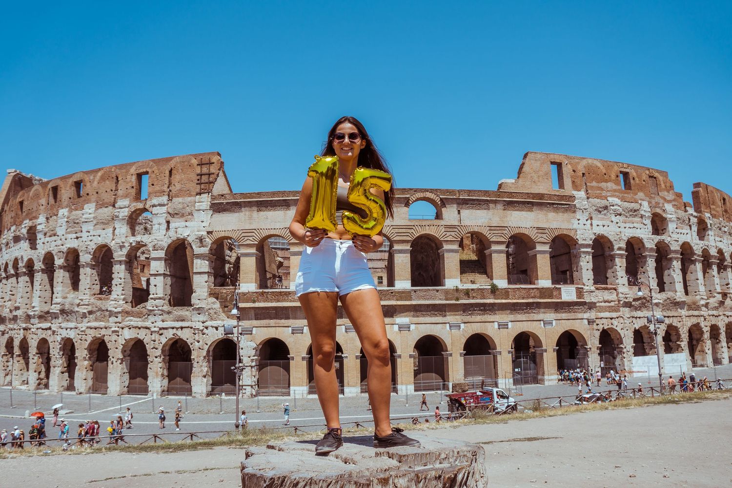 A sequence of panoramic photos showing the ancient Roman Colosseum with a person in a yellow top and shorts posing.