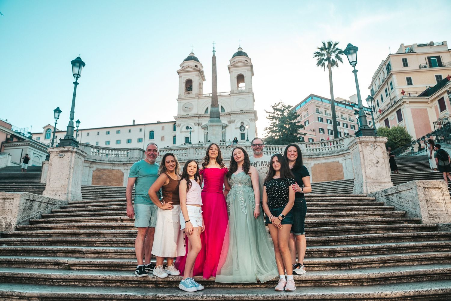 Group photo on the Spanish Steps in Rome with the Trinità dei Monti church in background.