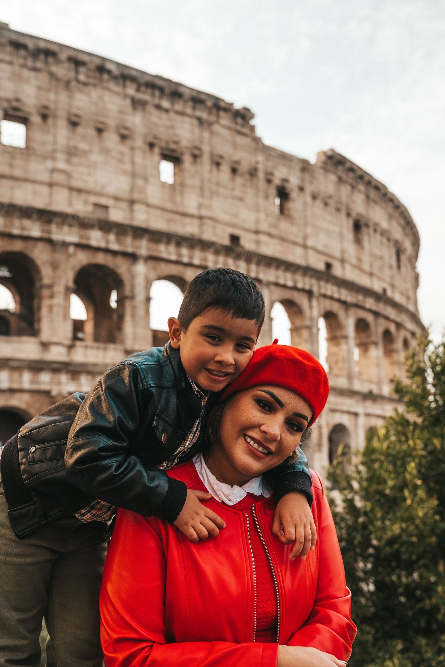 Heartwarming moment captured in front of the historic Colosseum in Rome.