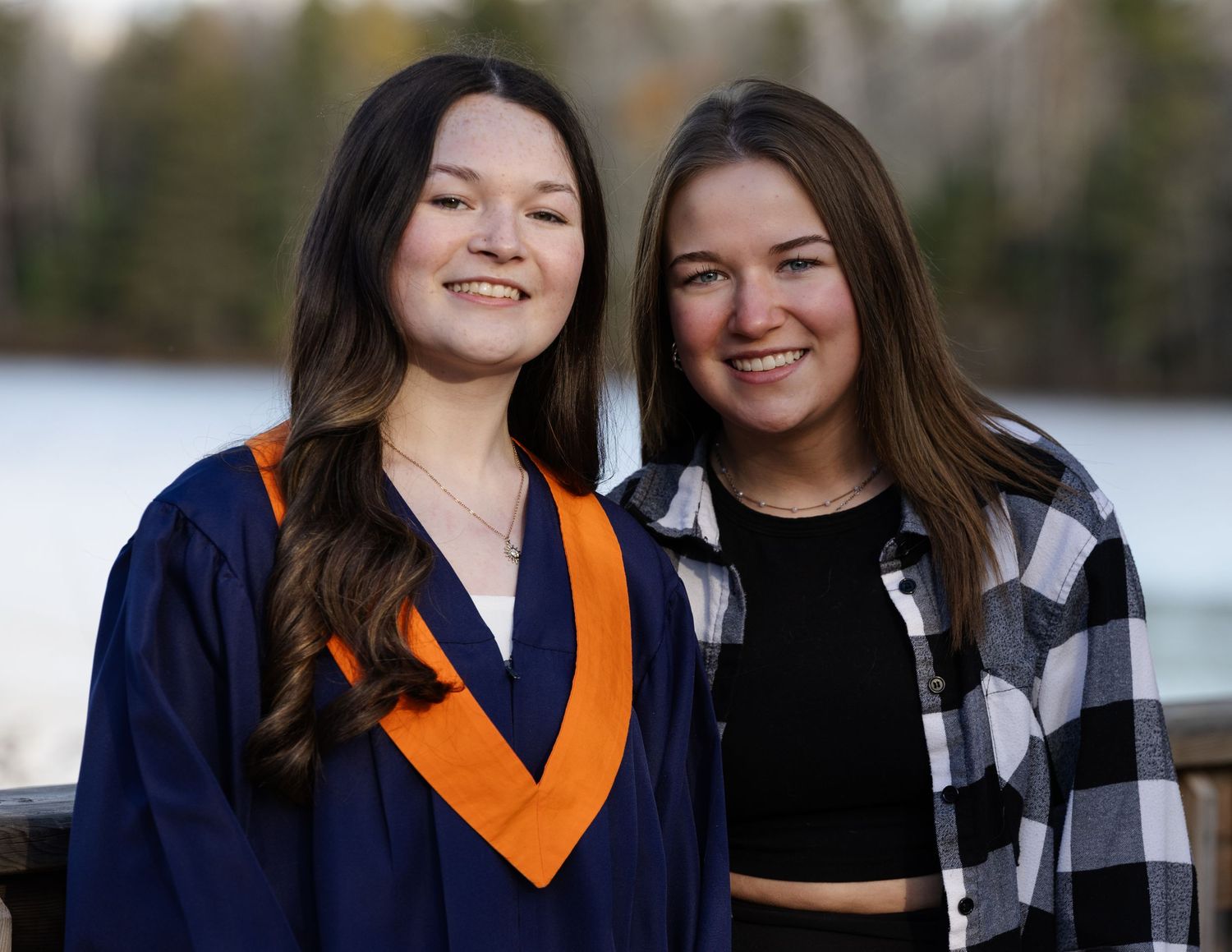 Graduate with friend or sibling