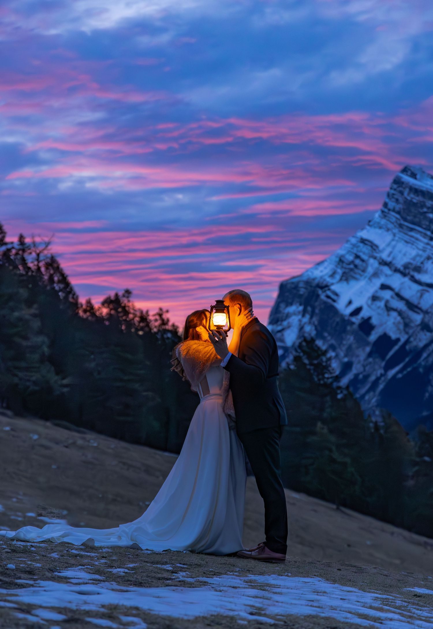 Bride and groom banff national park lanterns