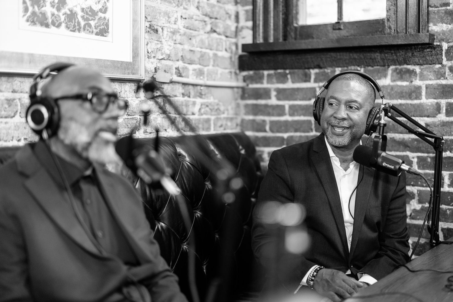 Black and white photo series of people engaged in animated conversation.