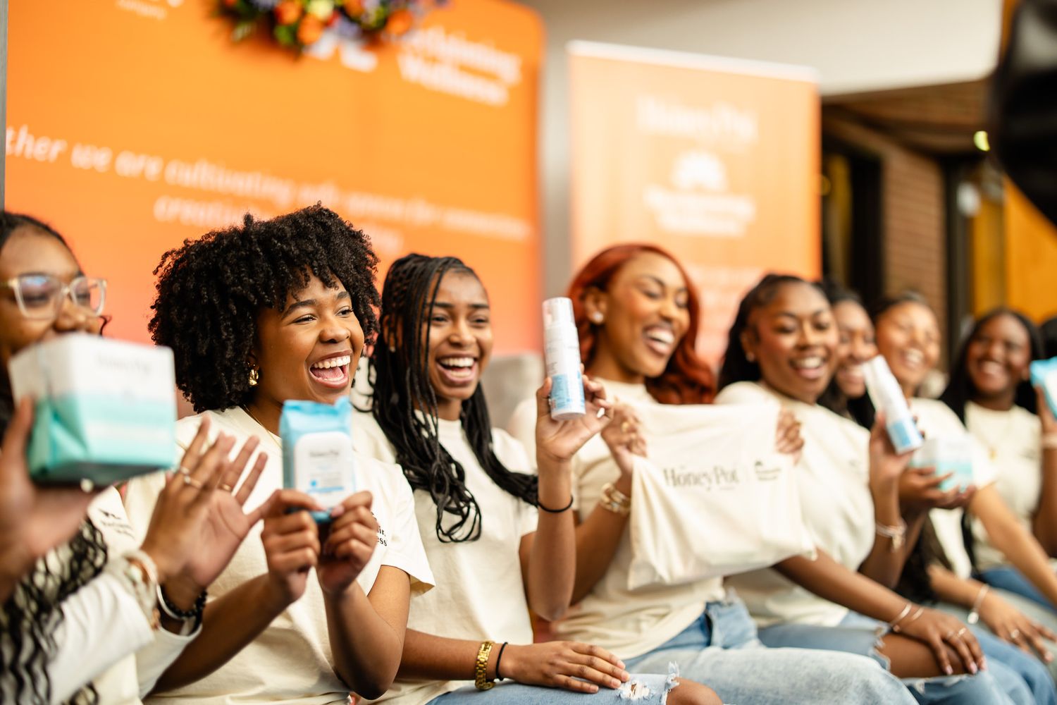 A group of enthusiastic attendees enjoying an engaging event or presentation.