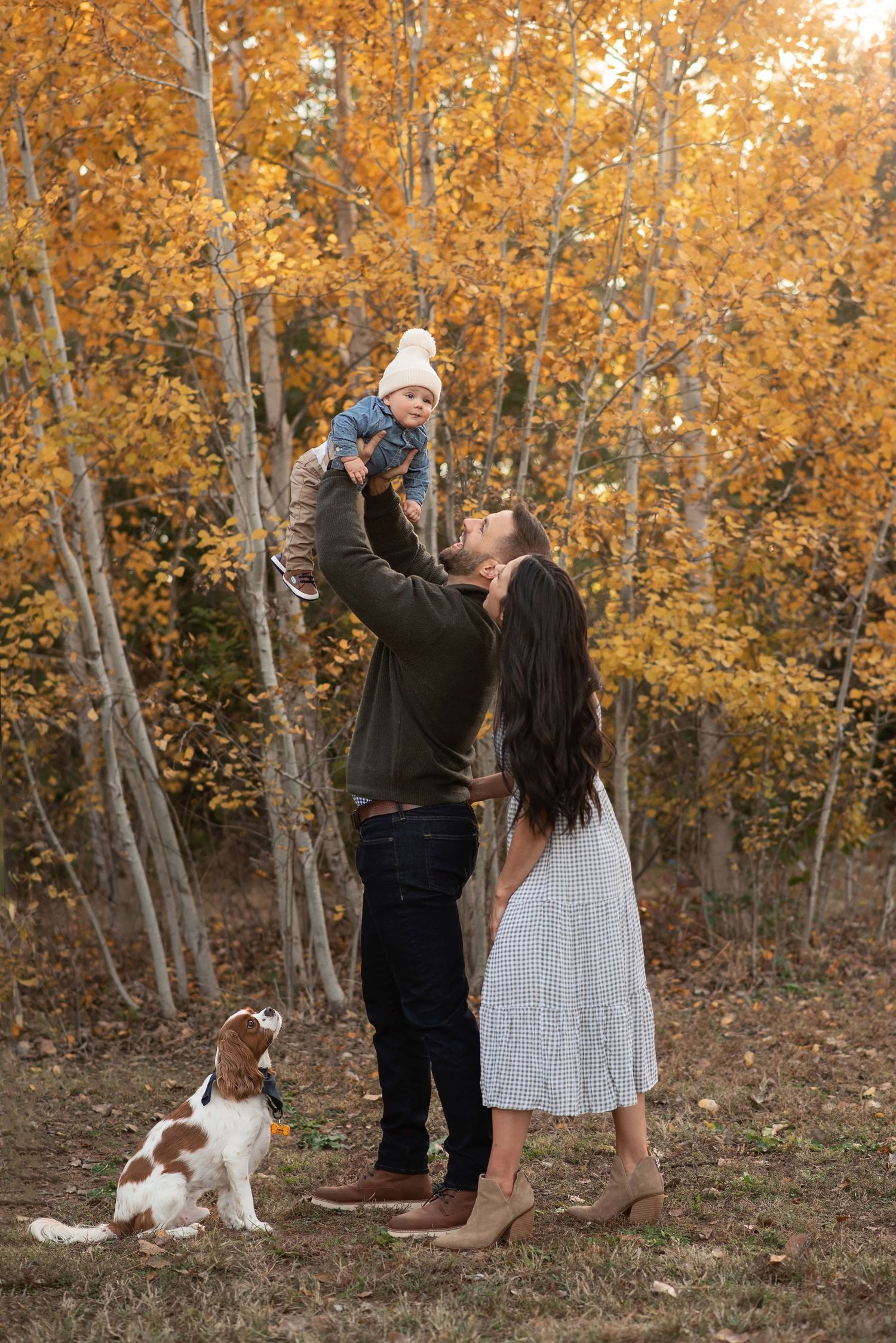 Family of 3 with a puppy