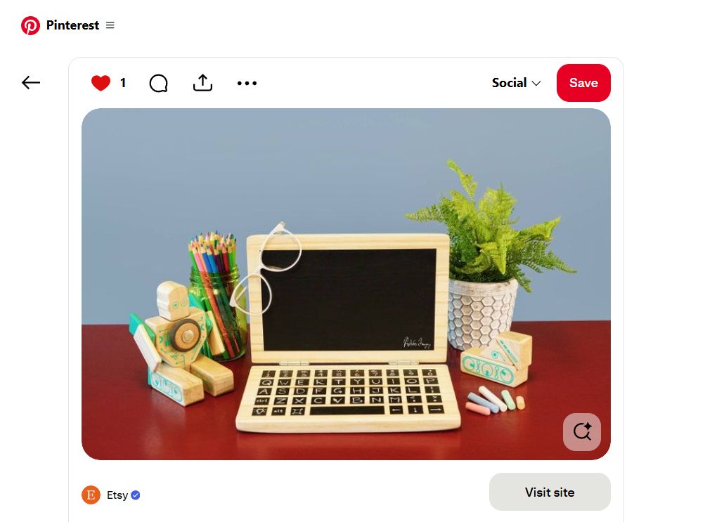 Etys's Official Pinterest pin featuring image of a hand-made wooden laptop toy taken by Artifex Imaging in Bakersfield.