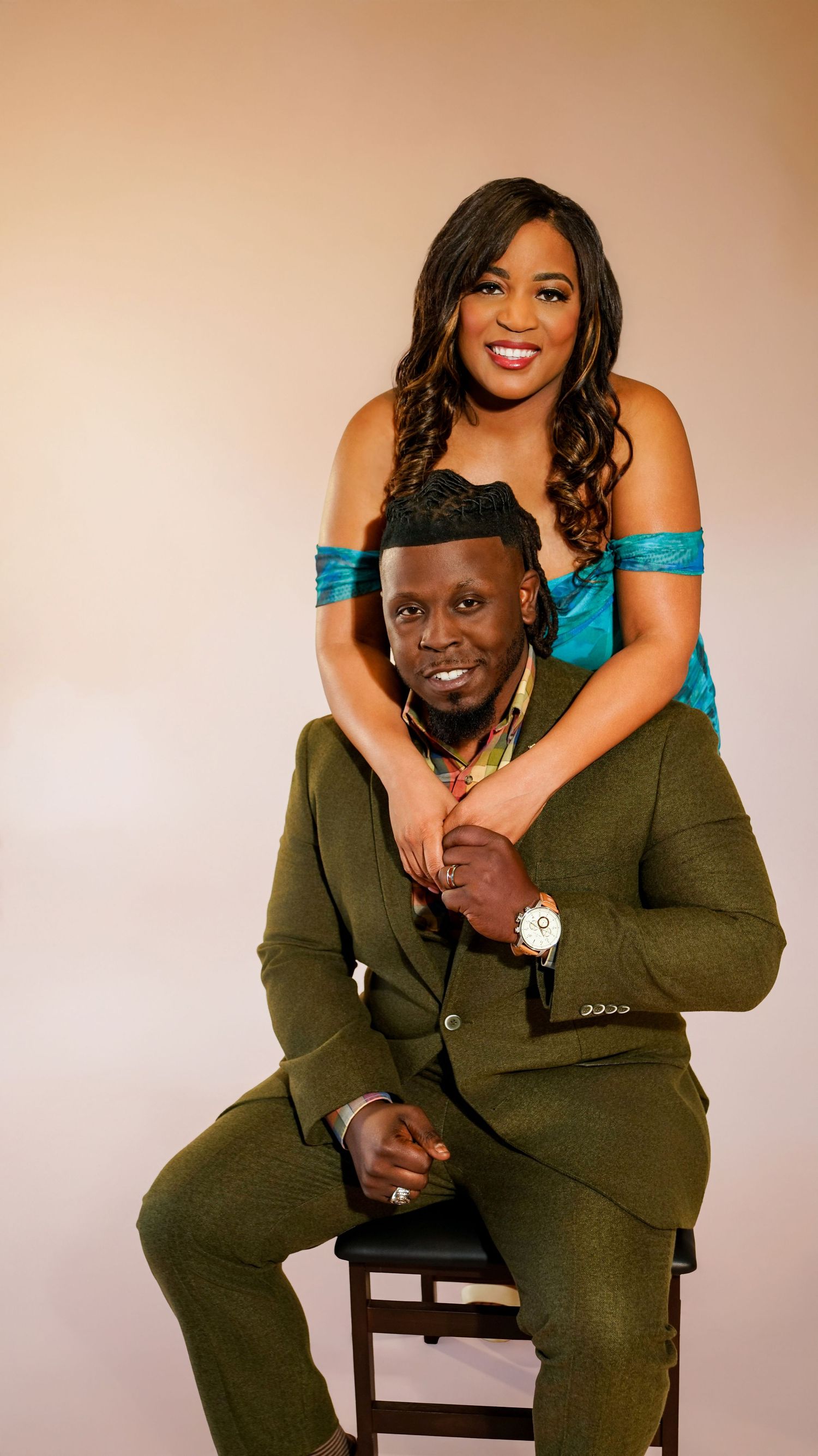 Family portrait taken at Artifex Imaging for Greet Seven Oaks Magazine featuring a young, generous, black couple in Bakersfield, CA.