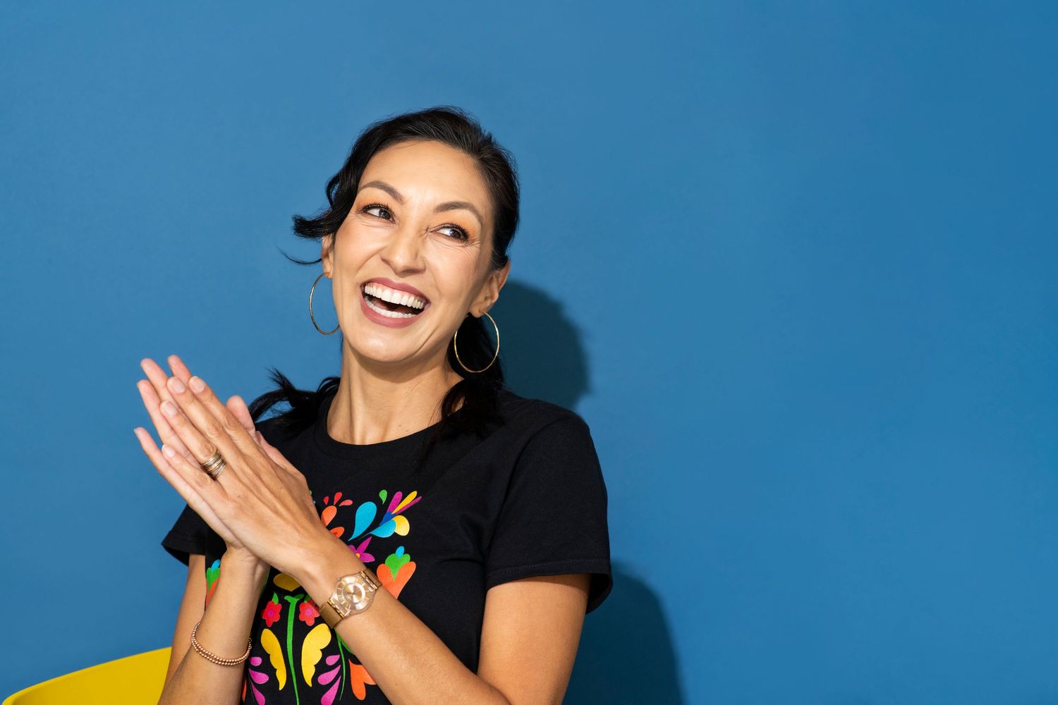 Series of expressive portraits against bright blue background showing animated gestures.