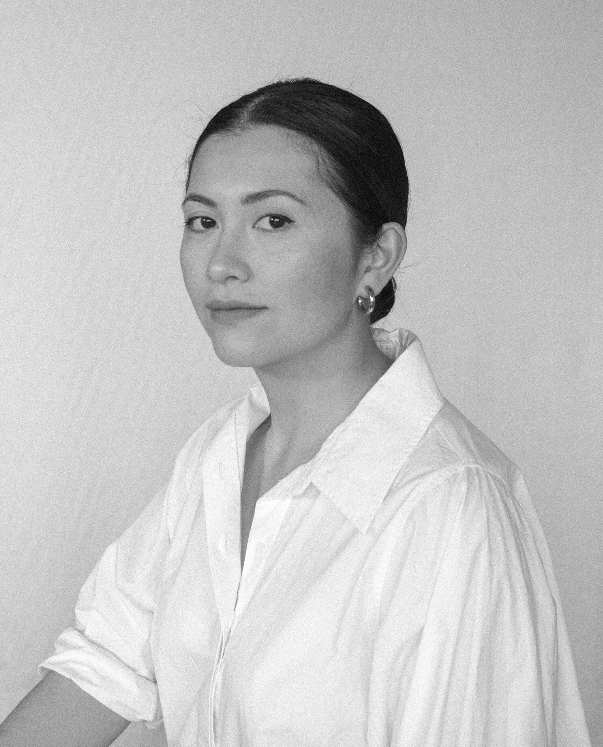 Professional headshot series in white button-down shirt against neutral background showing different elegant poses.