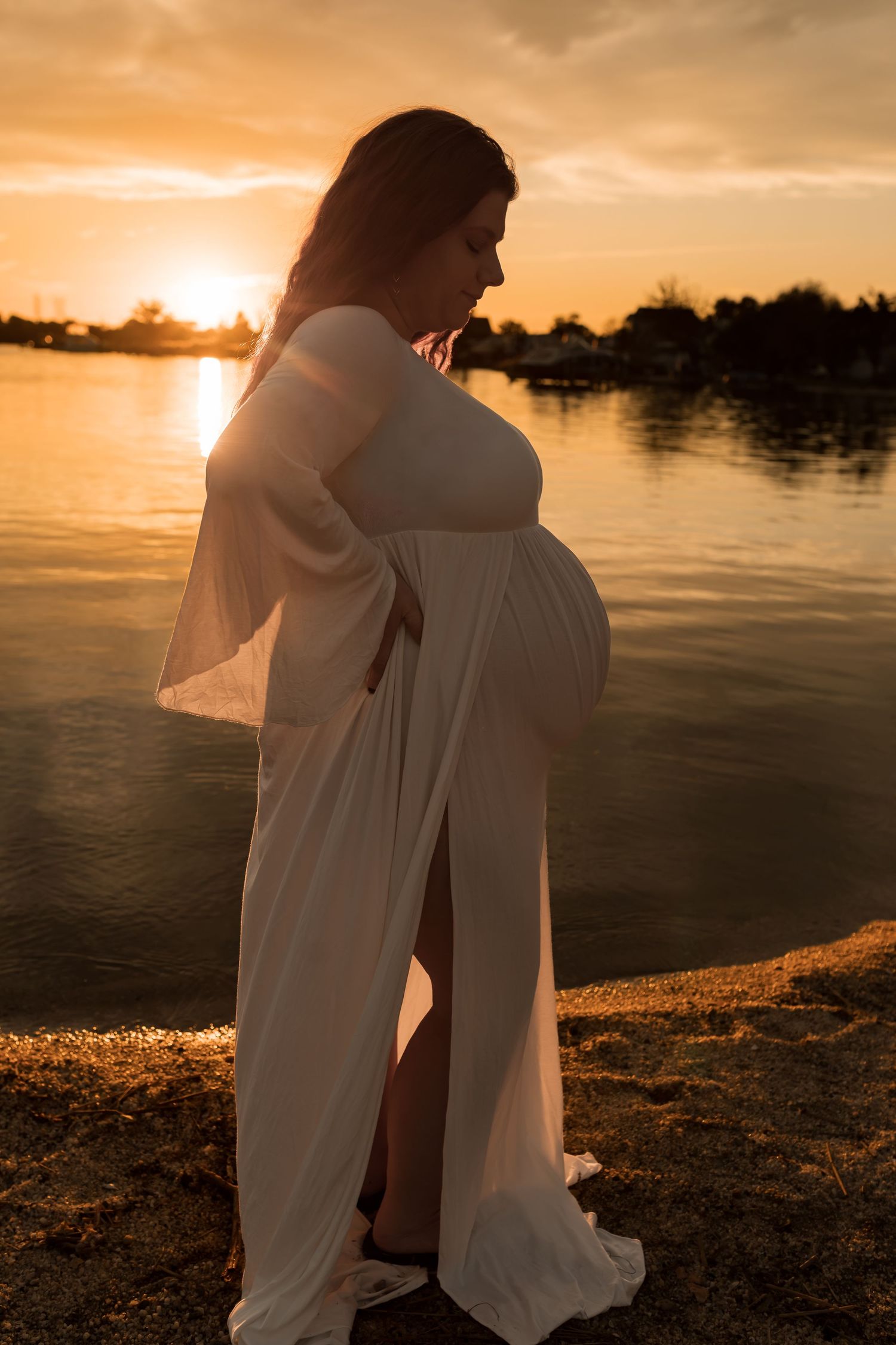 a romantic outdoor maternity photography session at sunset in Maryland.