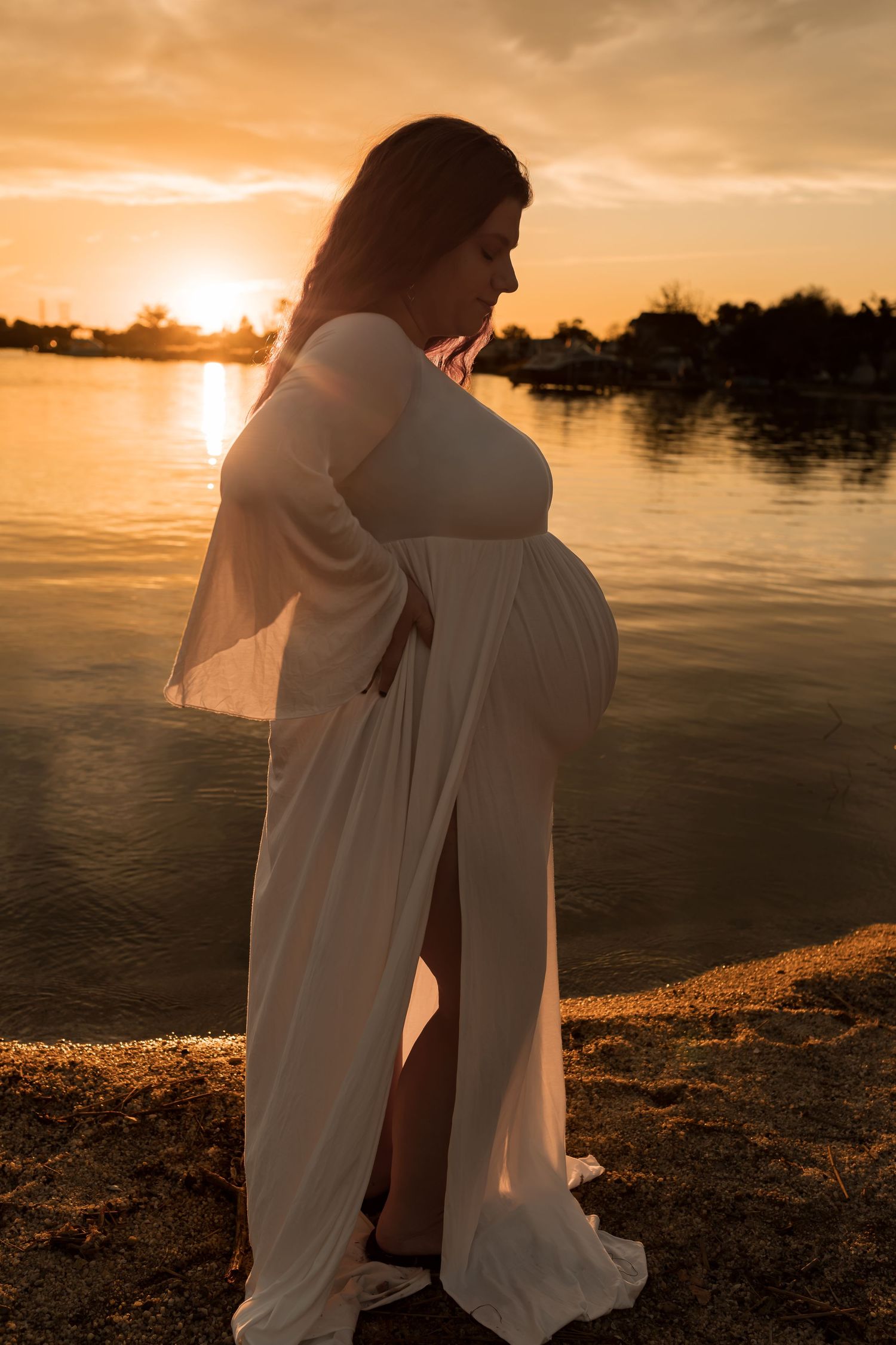 a romantic outdoor maternity photography session at sunset in Maryland.