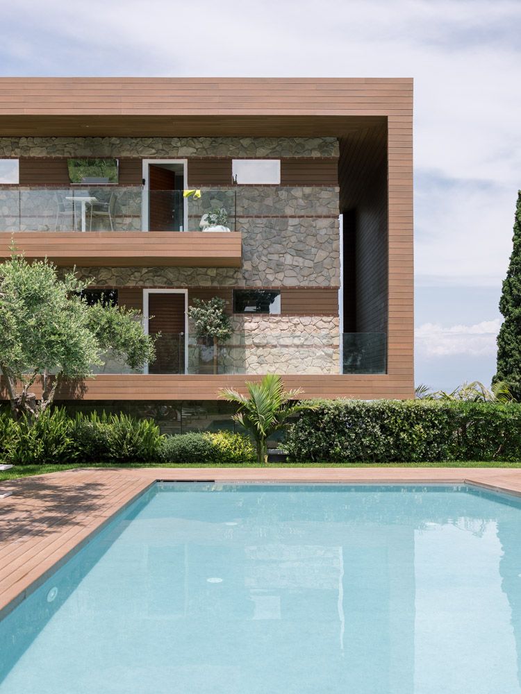 Isola Bella Infinity Suites hotel near Villa Mon Repos with pool and luxury guest accommodations for destination weddings in Sicily.