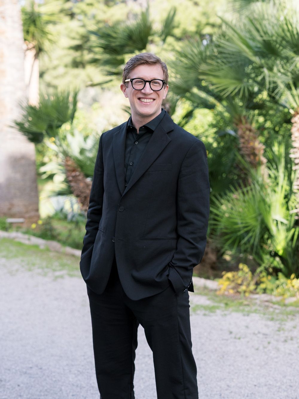 Fabio Faso, Italy-based destination wedding photographer, relaxed portrait during a wedding editorial shoot in Italy.