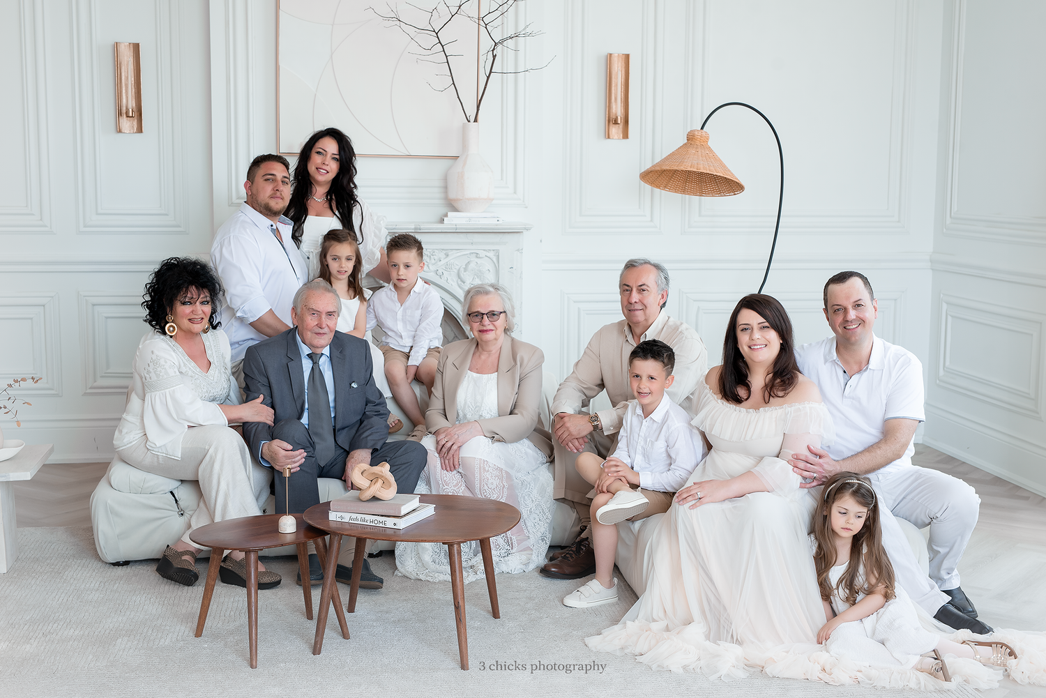 Large multigenerational family portrait in white studio setting, elegantly dressed in neutral tones. studio session
Oakville