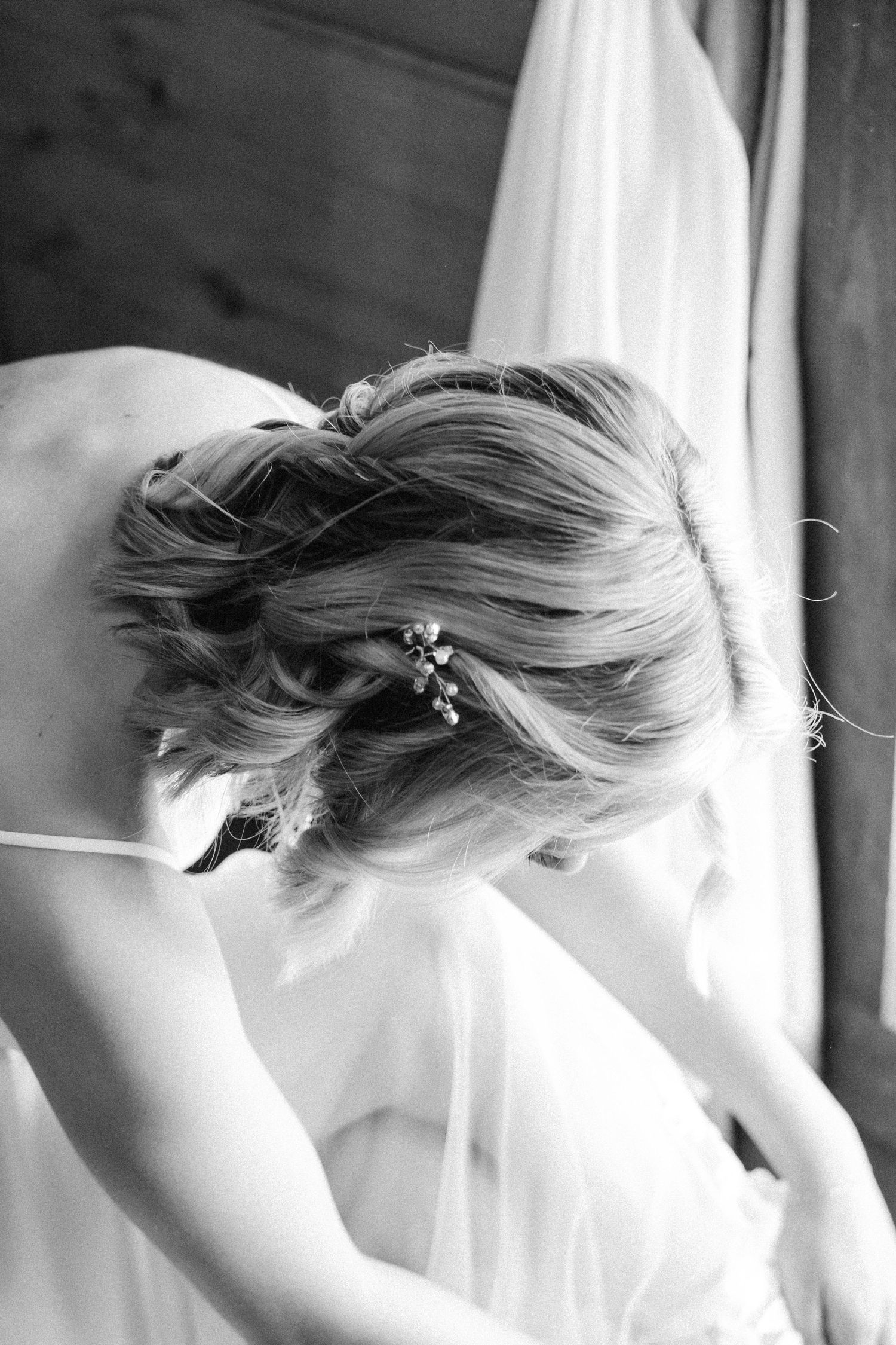 Artistic black and white bridal hair and veil detail shots.