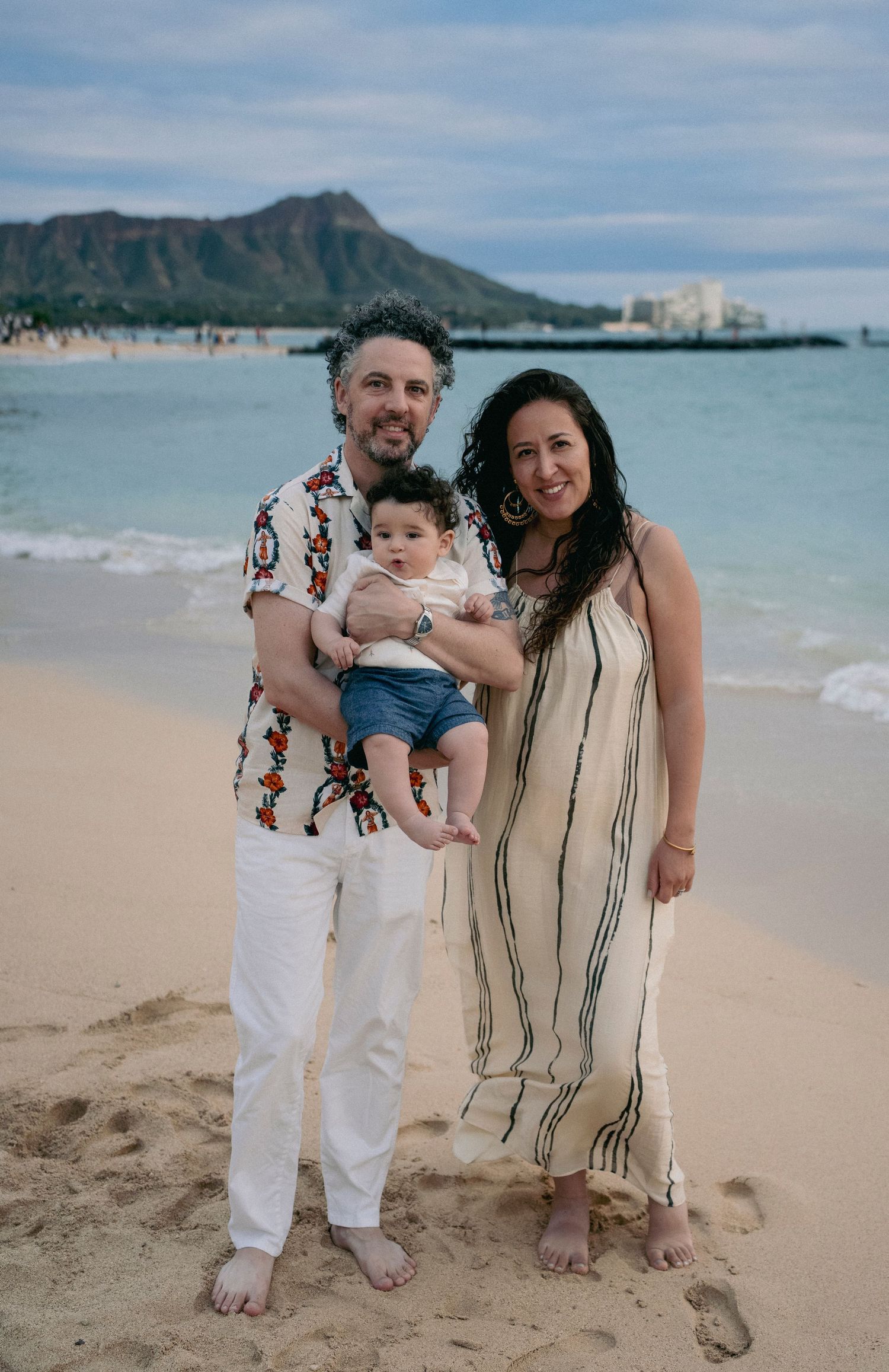 Casual family photos on Waikiki Beach with Diamond Head and ocean views.