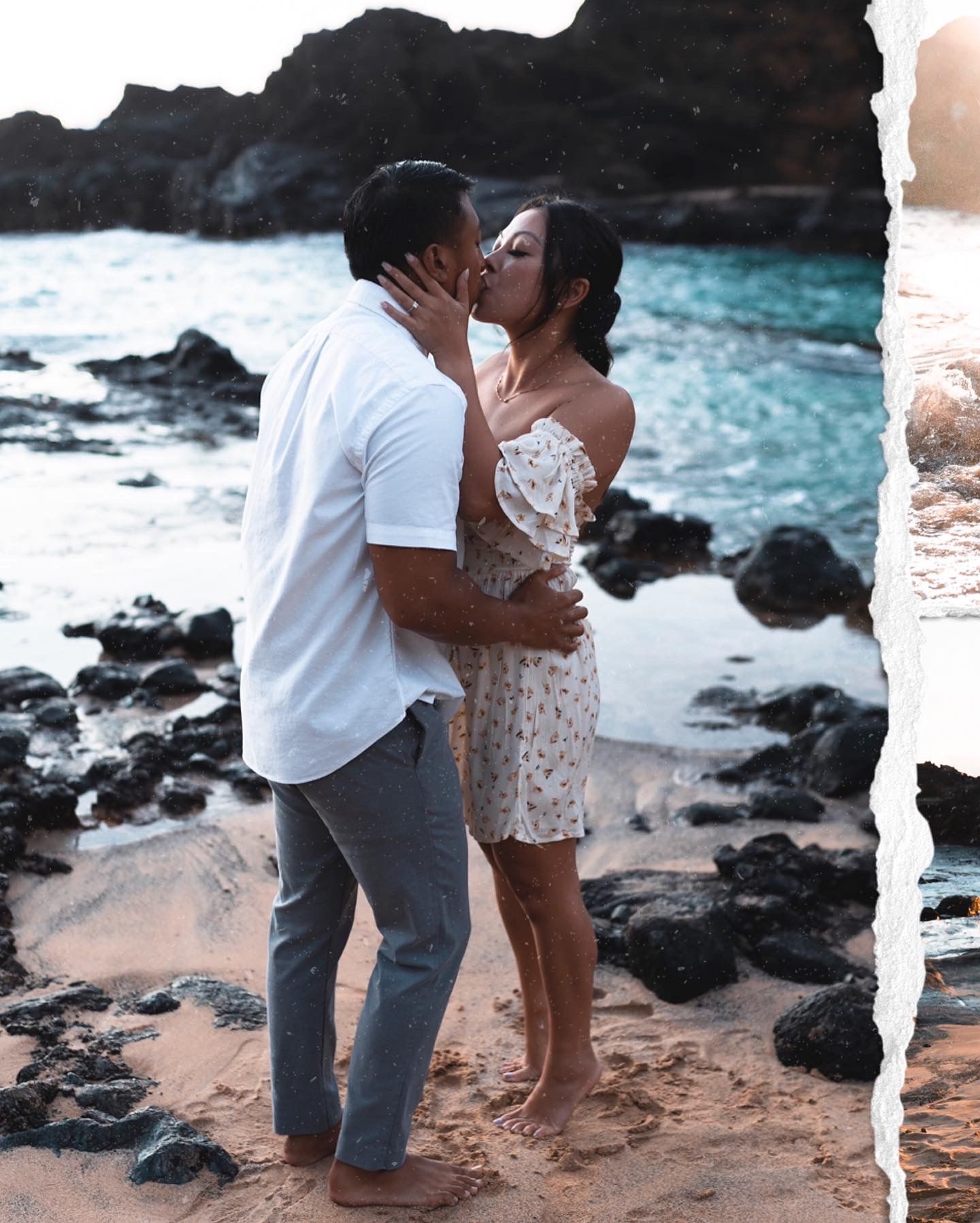 Couple sharing an intimate moment on a rocky beach with ocean waves in the background.