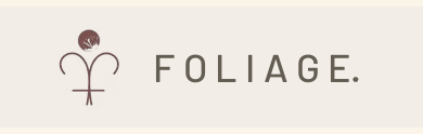 Vintage sepia-toned decorative header with ornate text reading 'Foliage' and floral design elements.復古棕褐色調的裝飾標題，飾有華麗的文字“葉子”和花卉設計元素。