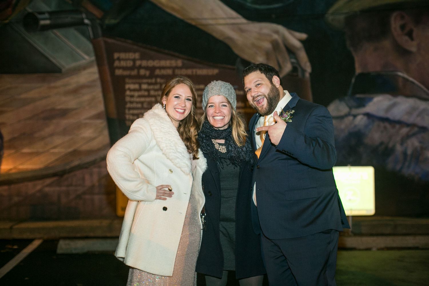 Candid winter wedding moments with guests celebrating indoors.