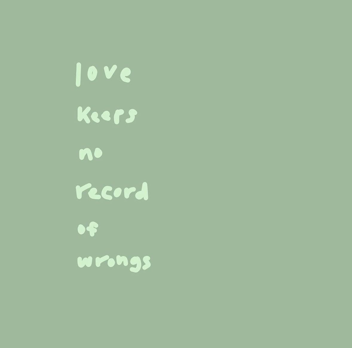 Sage green square print with handwritten text reading love keeps no record of wrongs, a biblical quote from 1 Corinthians.