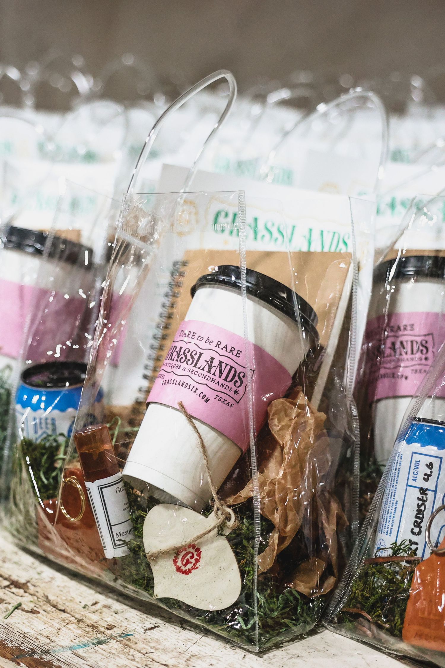 Grasslands branded gift bags filled with local artisan products and candles.