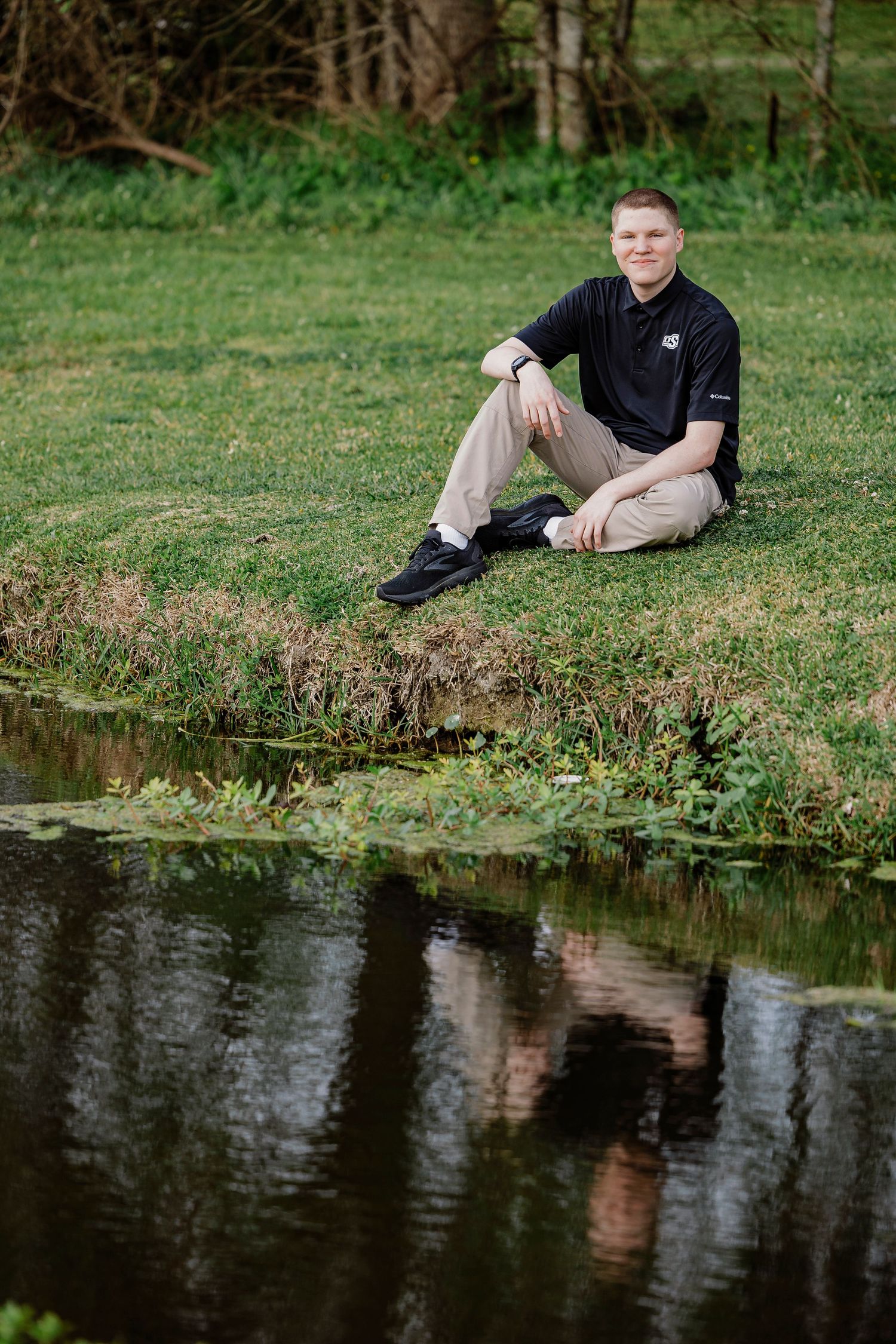 Senior boy portrait session in Houston Texas with natural light outdoor setting