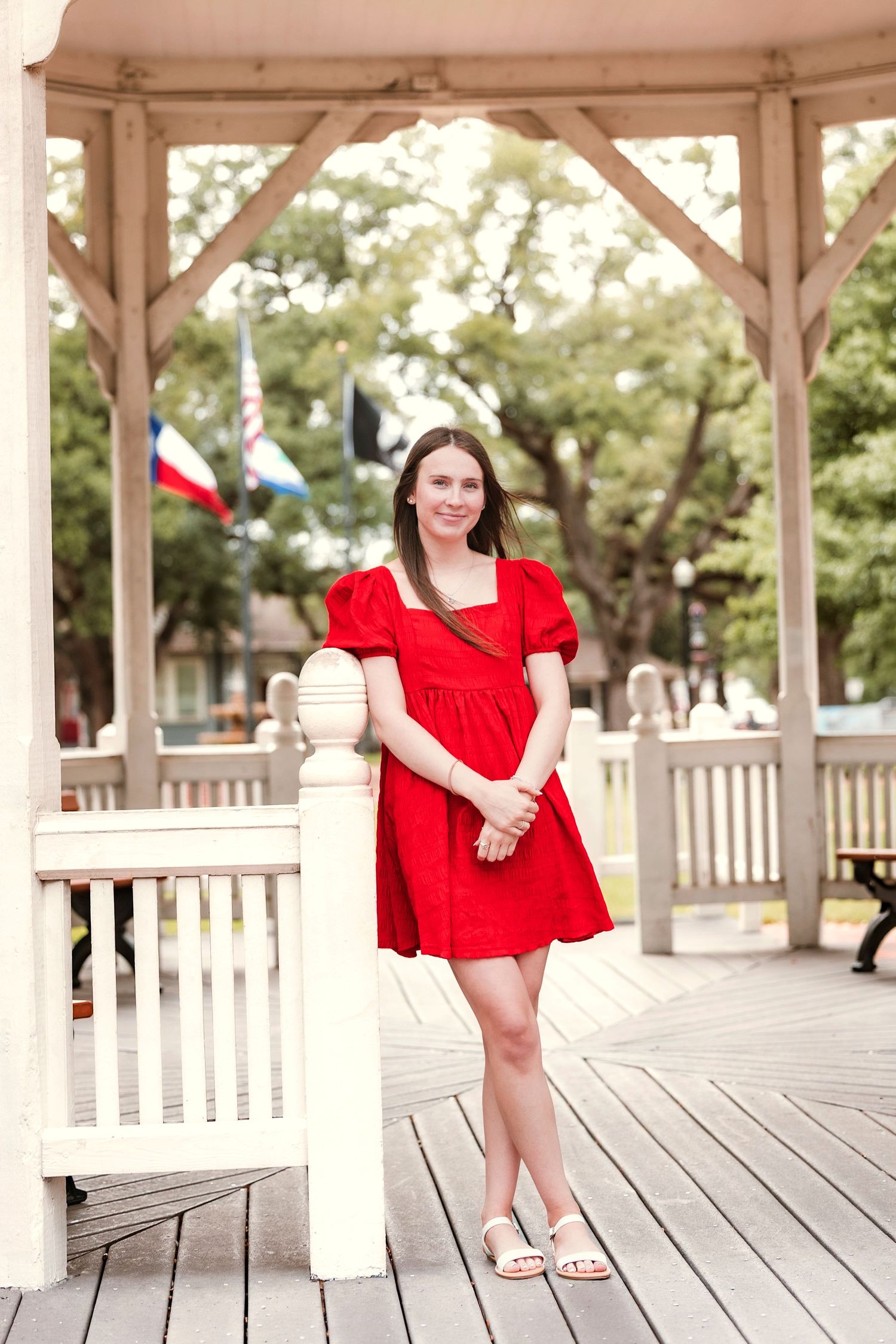 Senior graduation photos in Houston area with warm sunset tones and natural posing