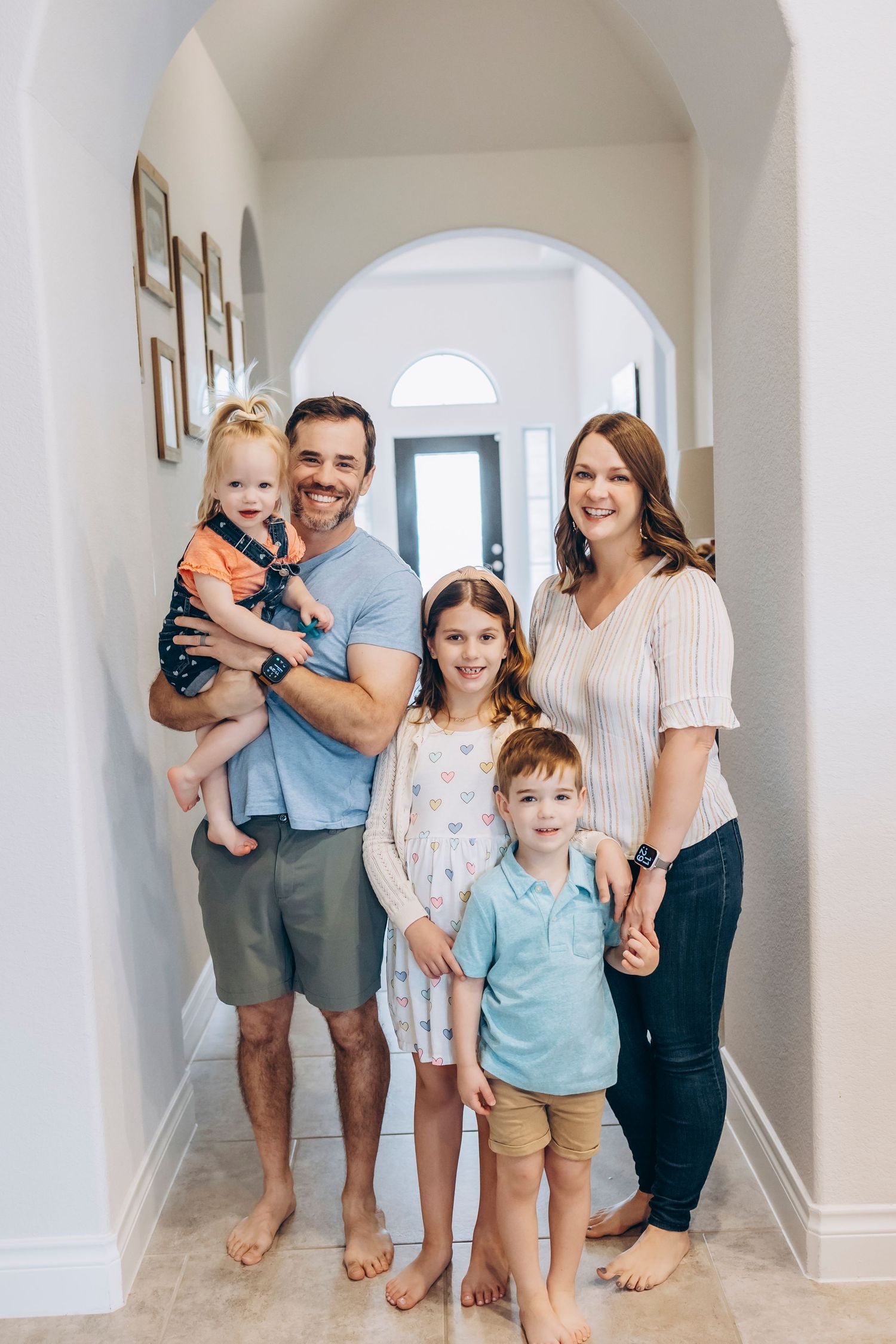 Indoor lifestyle family photography session in Houston Texas with natural light and candid moments