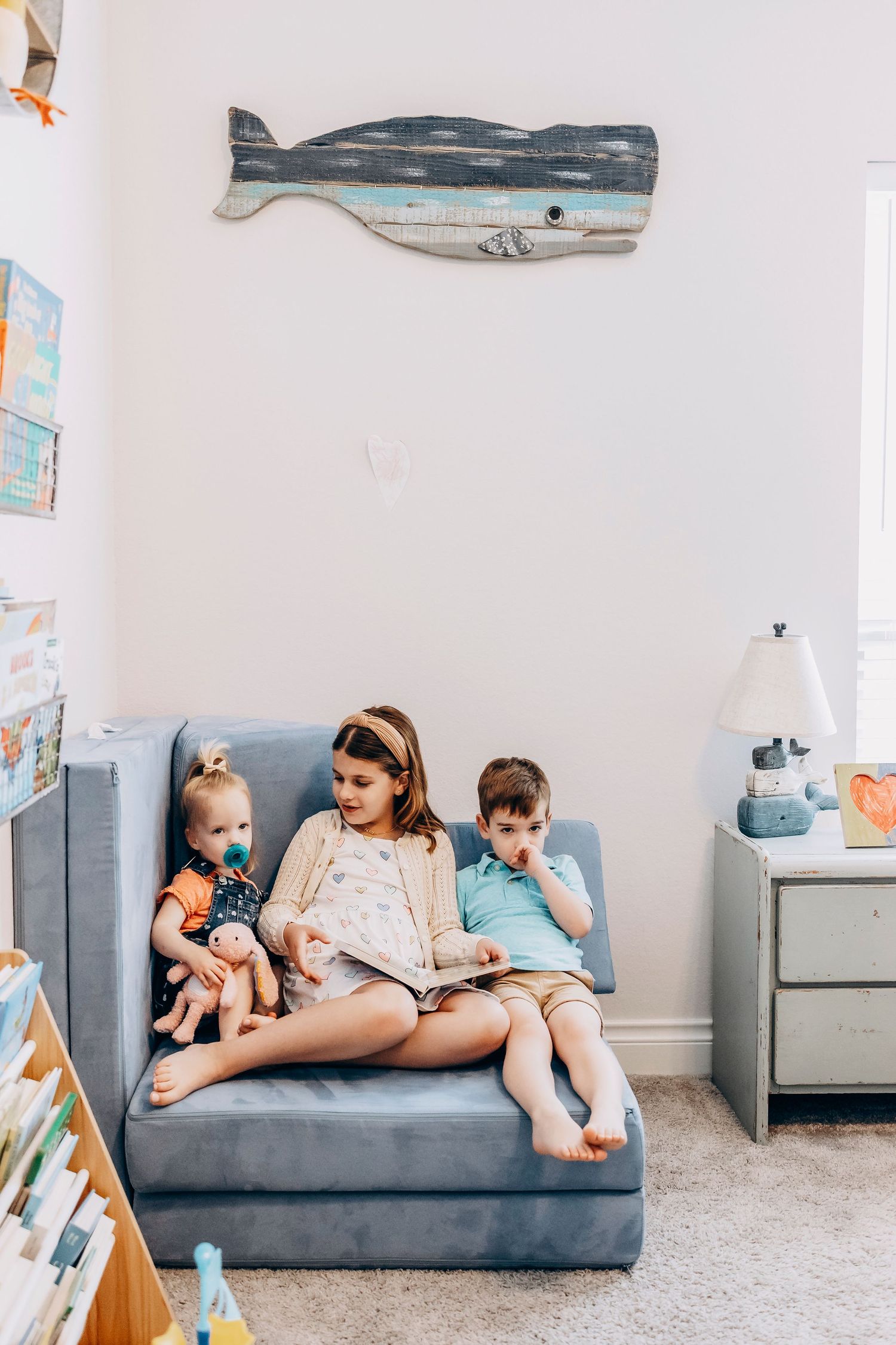 Natural light indoor family session in Houston area with relaxed candid interactions