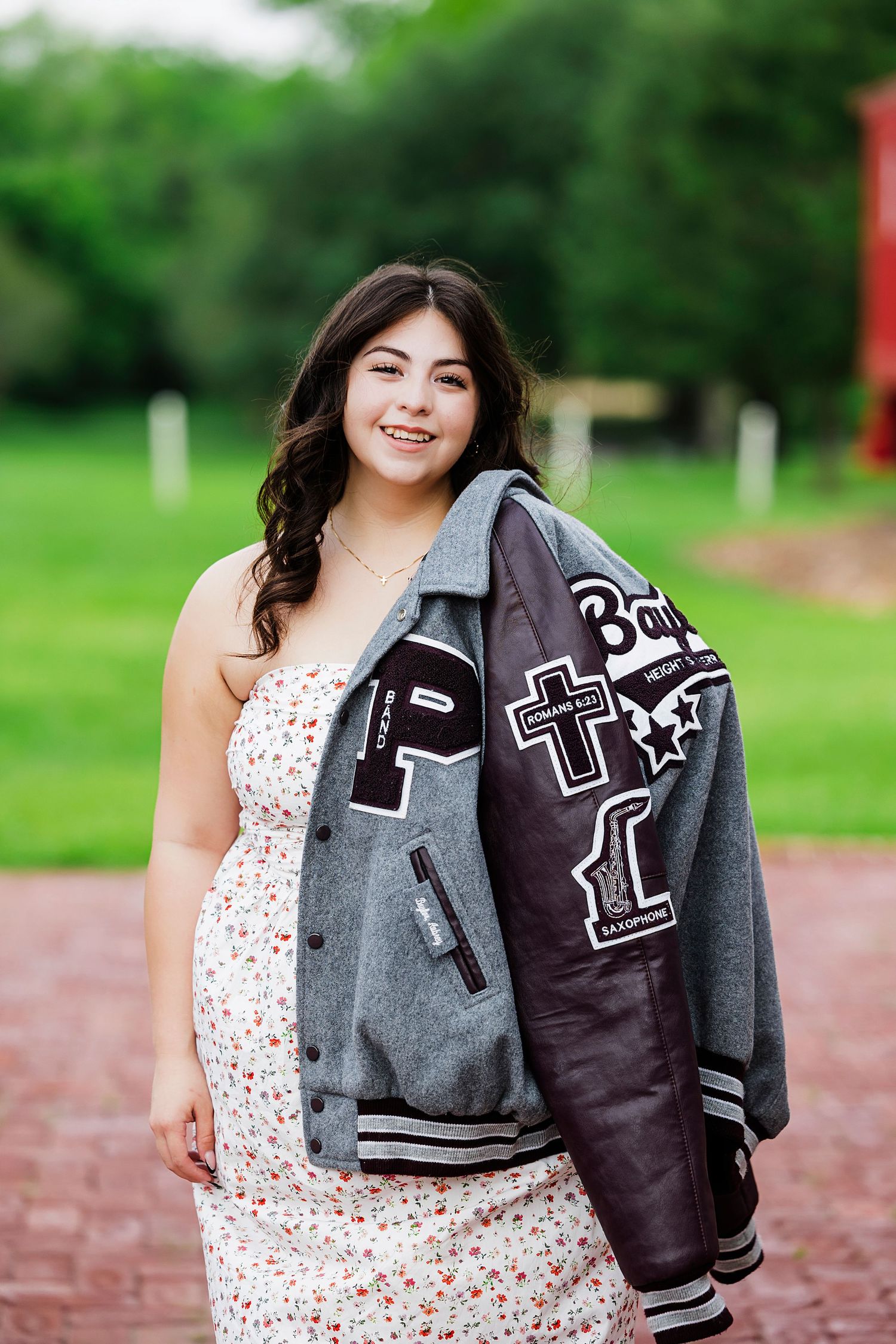 Senior graduation photos in Houston area with warm sunset tones and natural posing