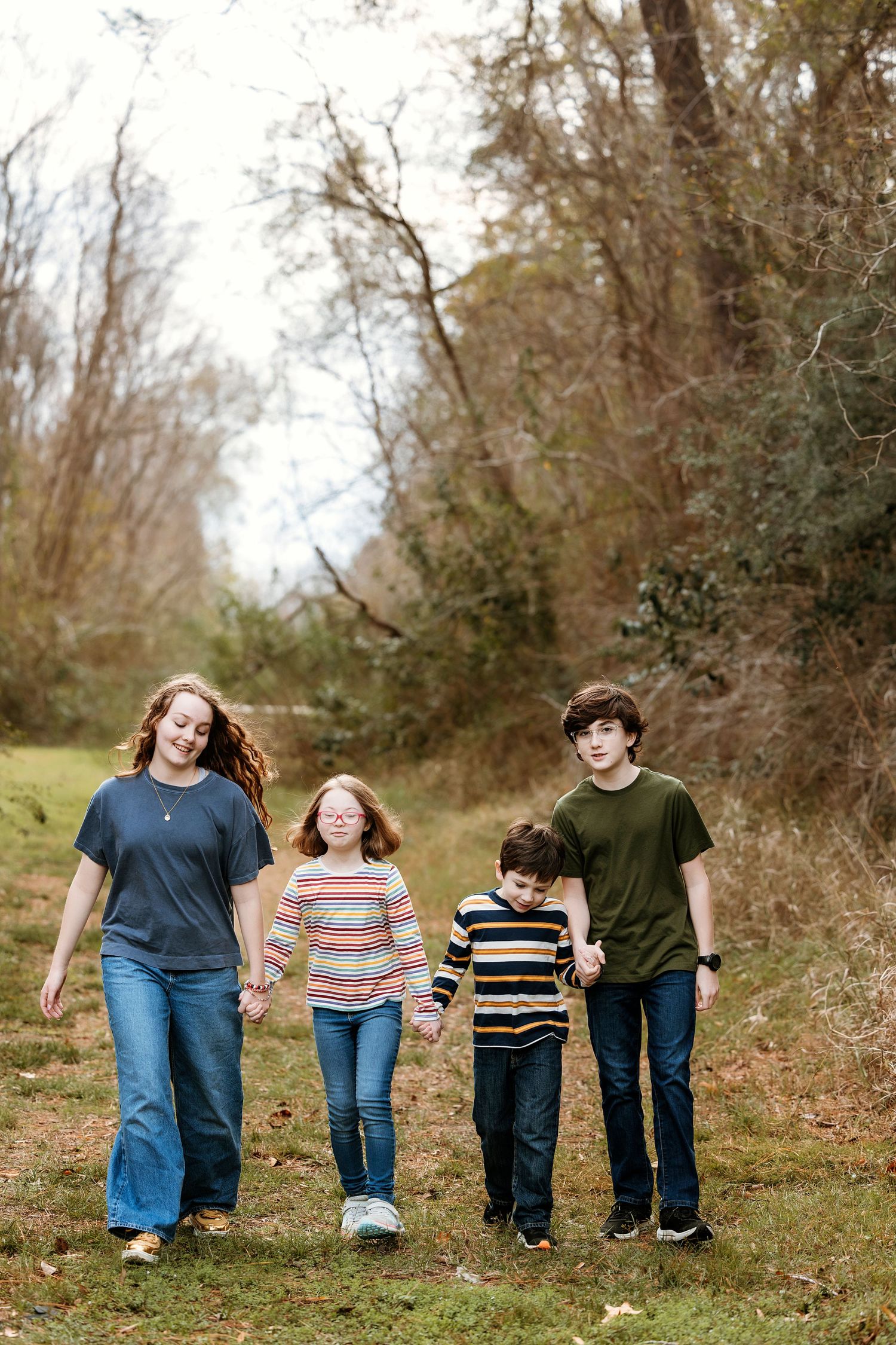 Houston area family photographer capturing candid moments in Pearland TX during golden hour