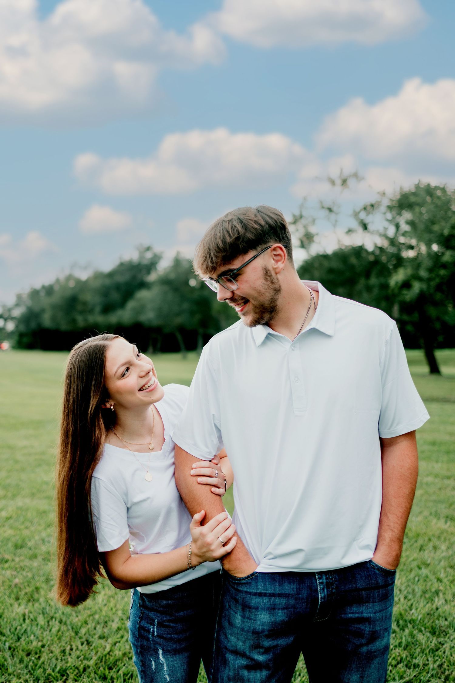 Romantic couple session in Pearland TX during golden hour with earthy true-to-color tones