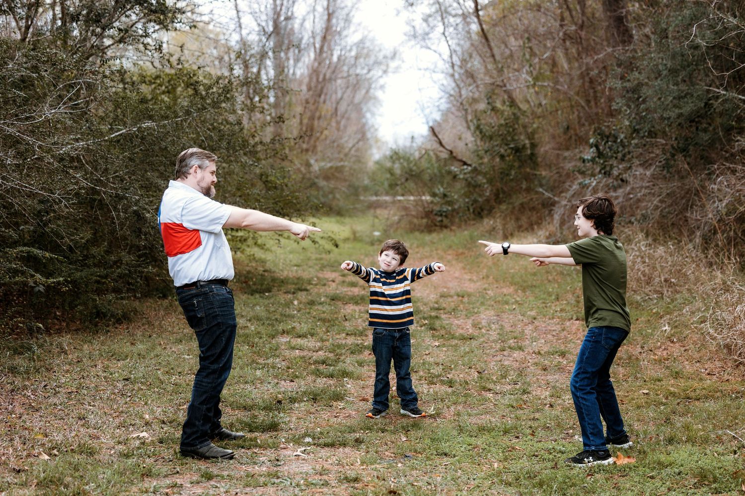 Family photography session in Pearland Texas with parents and children outdoors in natural light