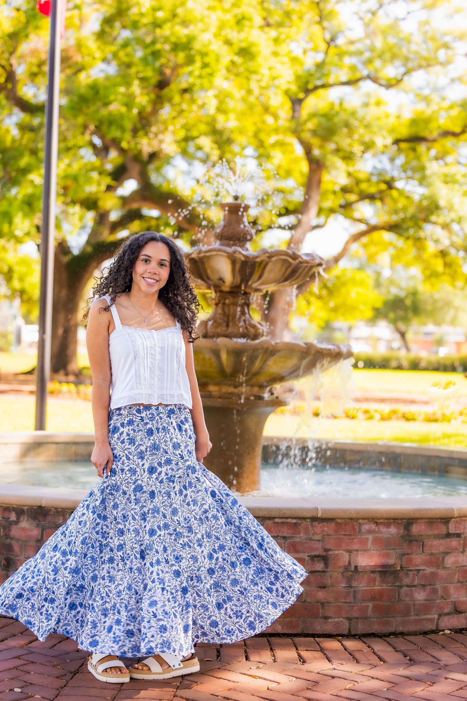 Senior graduation photos in Houston area with warm sunset tones and natural posing