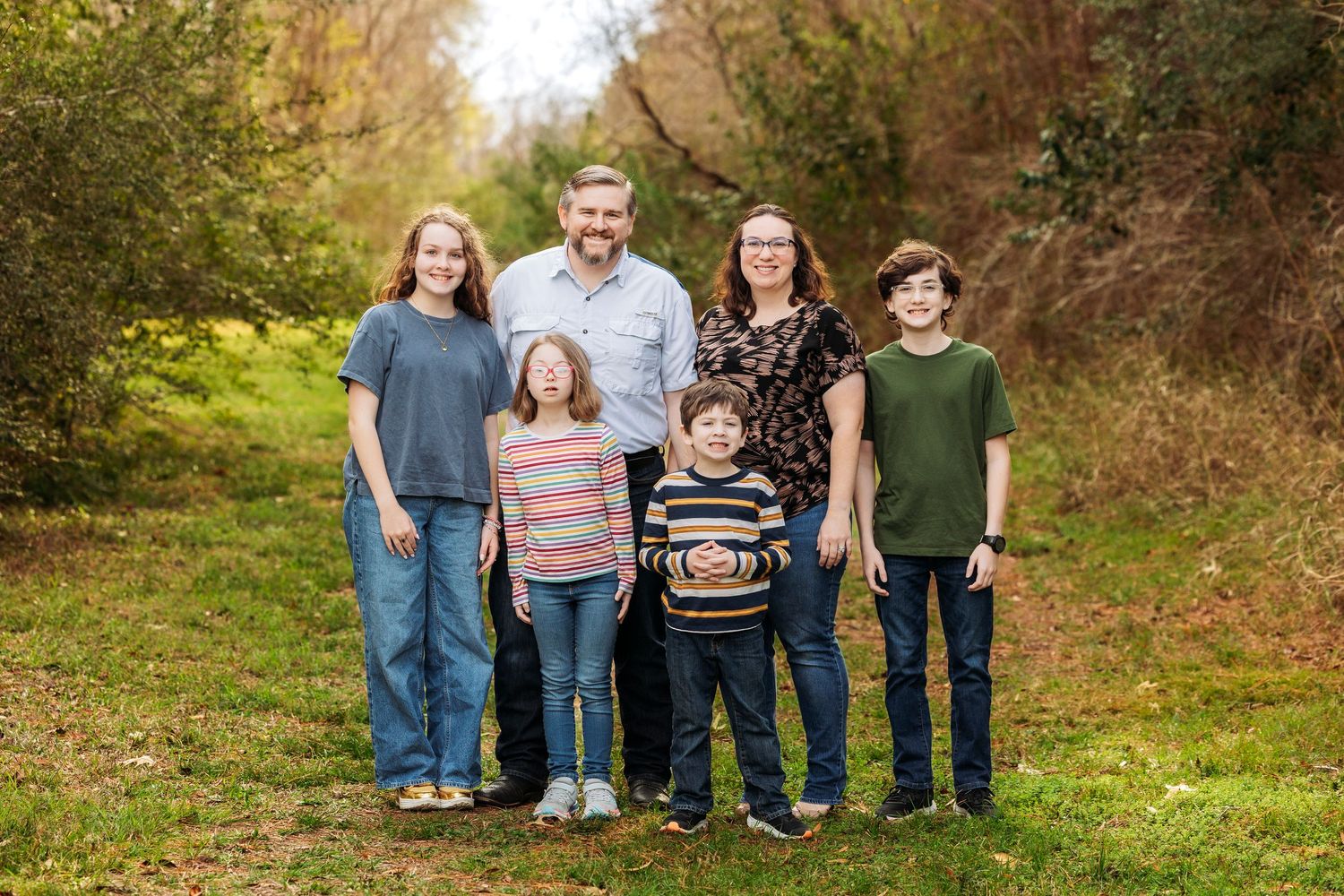 Natural light family portraits in Pearland Texas with warm, timeless style