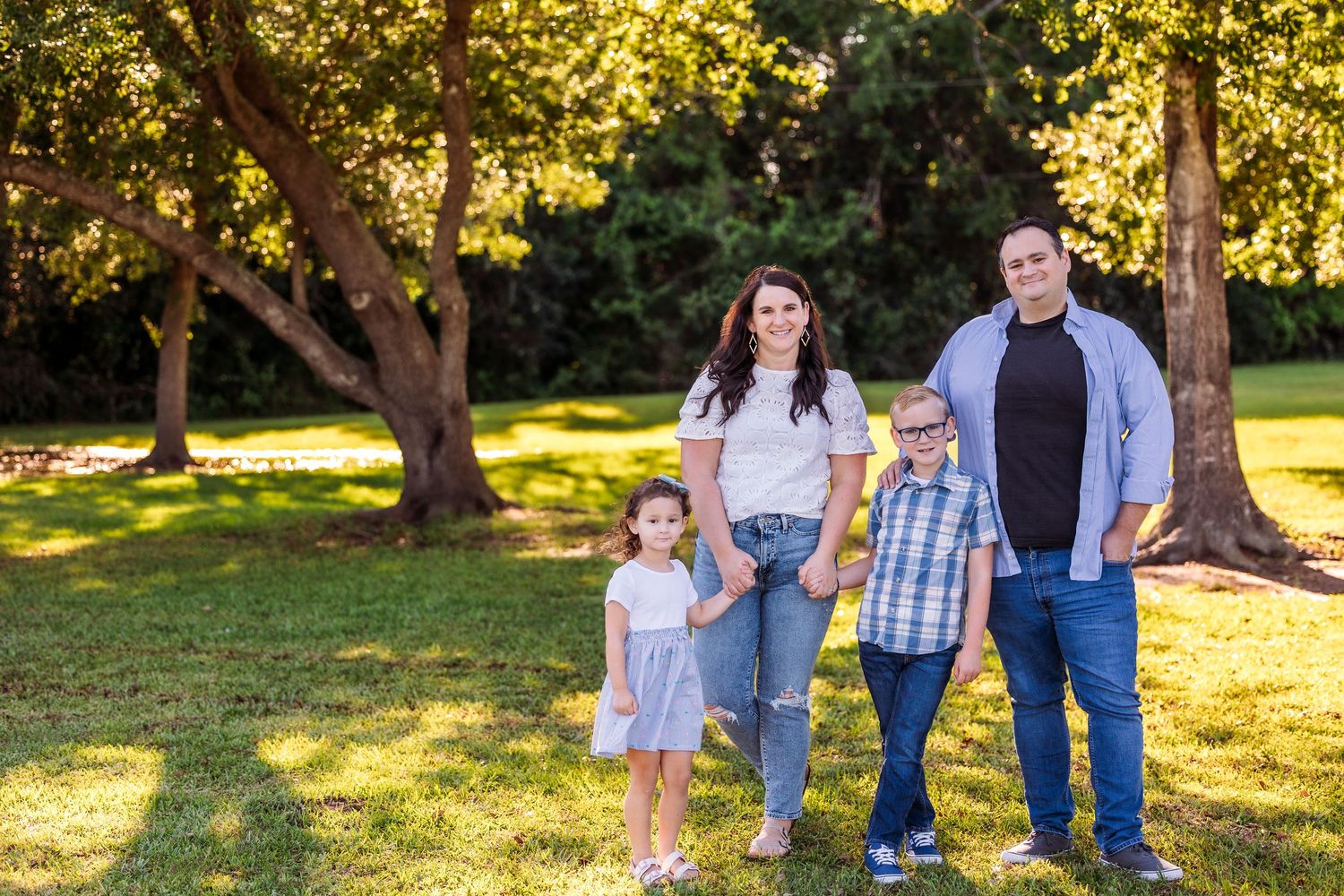 Natural light family portraits in Pearland Texas with warm, timeless style