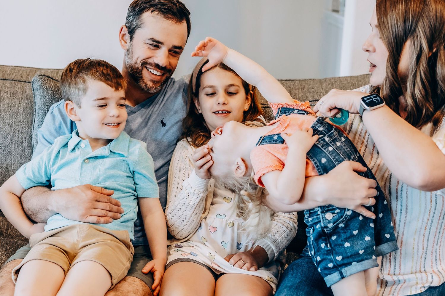 Pearland TX family photographer capturing cozy indoor lifestyle portraits at home