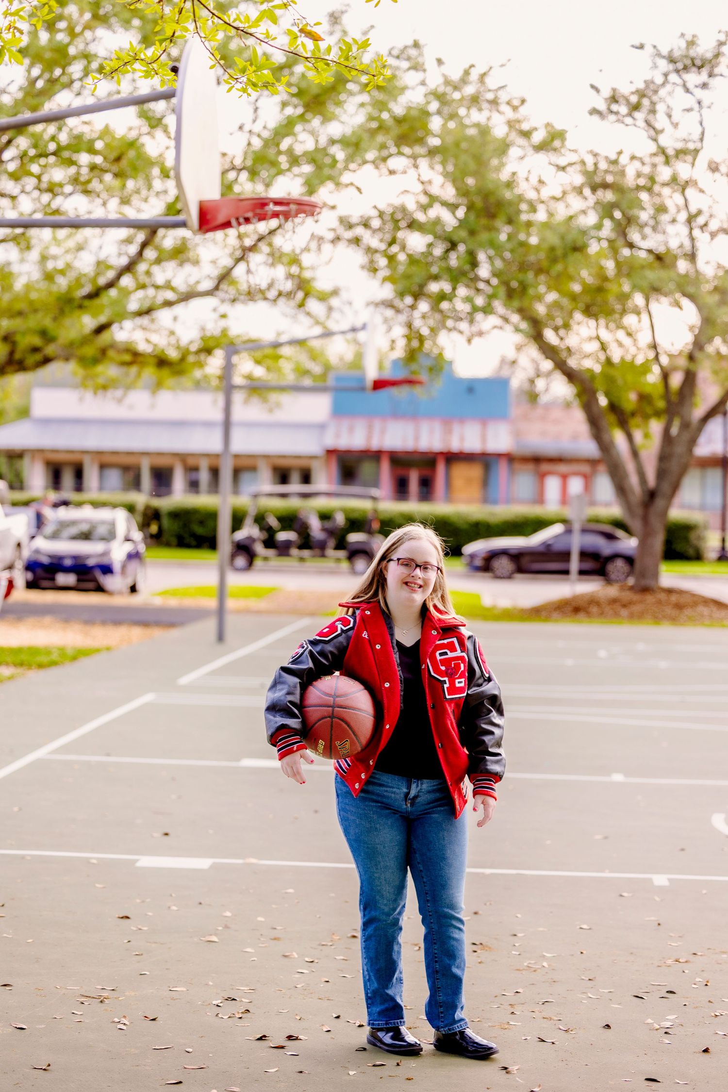 Candid senior portraits in Pearland Texas during golden hour outdoor session