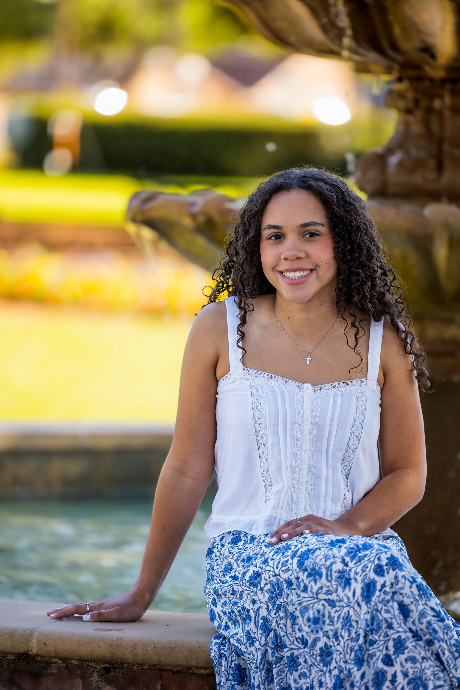 Senior graduation photos in Houston area with warm sunset tones and natural posing